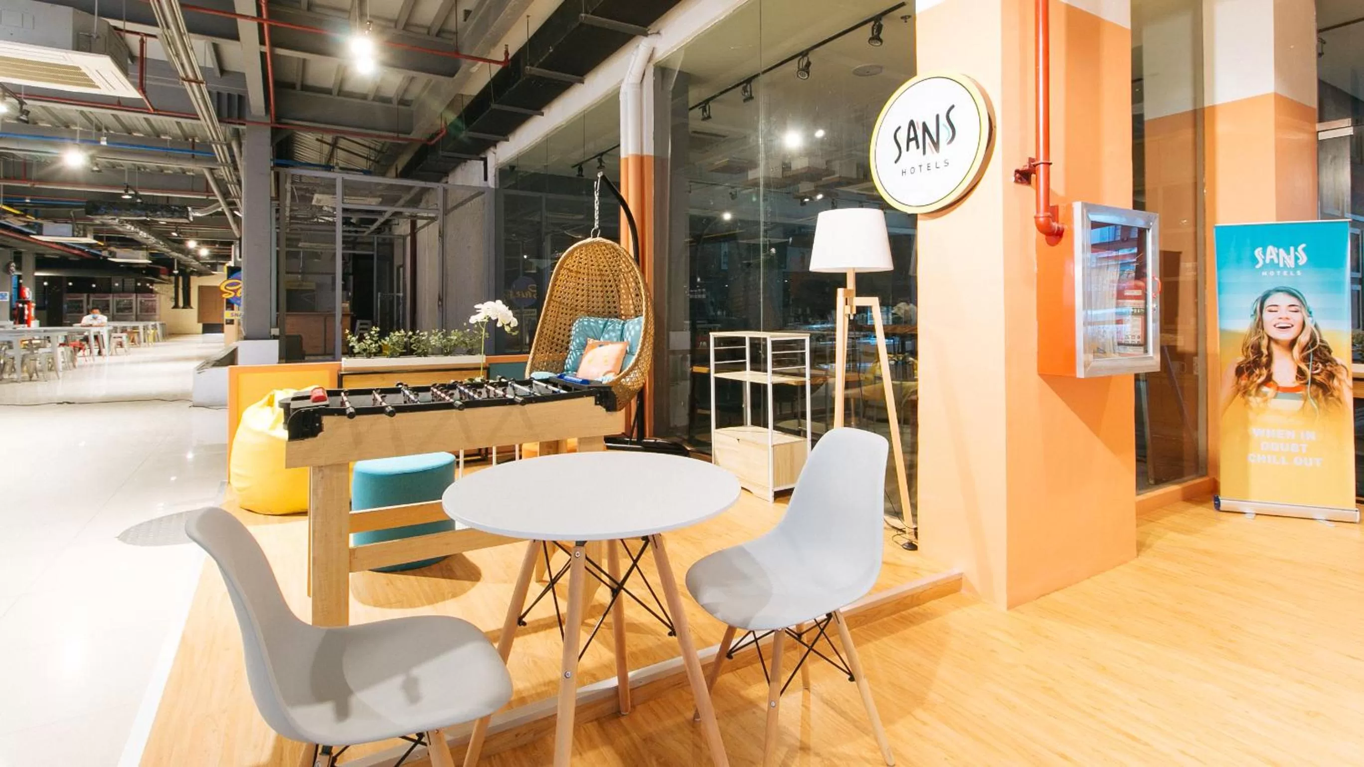 Seating area in Sans Hotel Laperal Manila