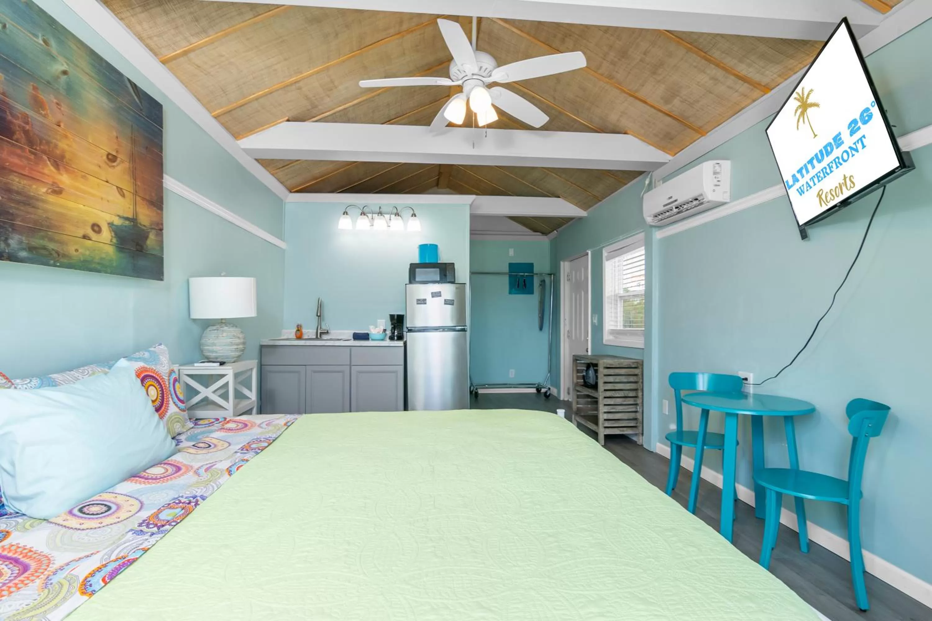 Photo of the whole room, Bed in Latitude 26 Waterfront Resort and Marina