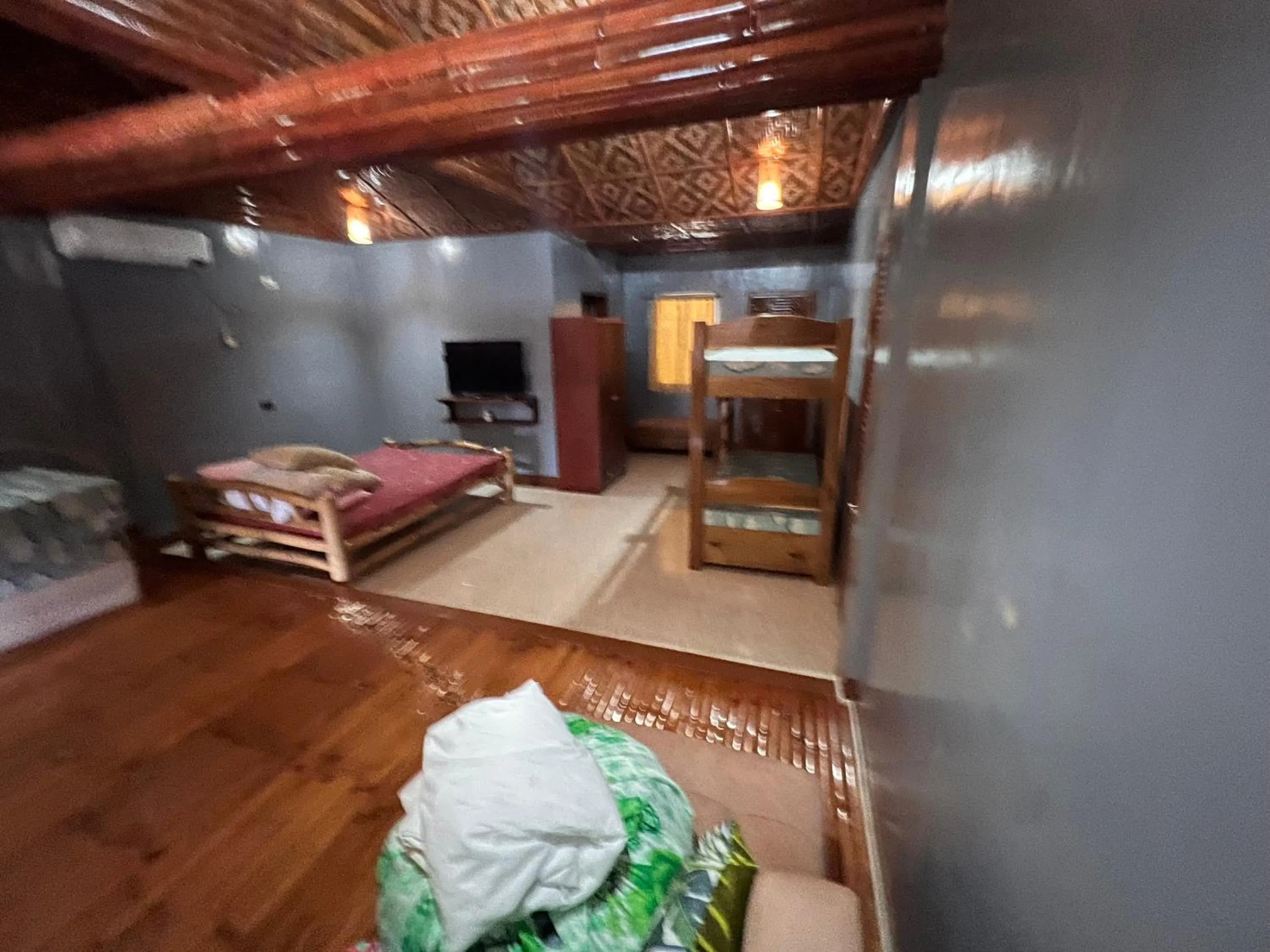 Communal lounge/ TV room, Bed in Gratum Beach Resort