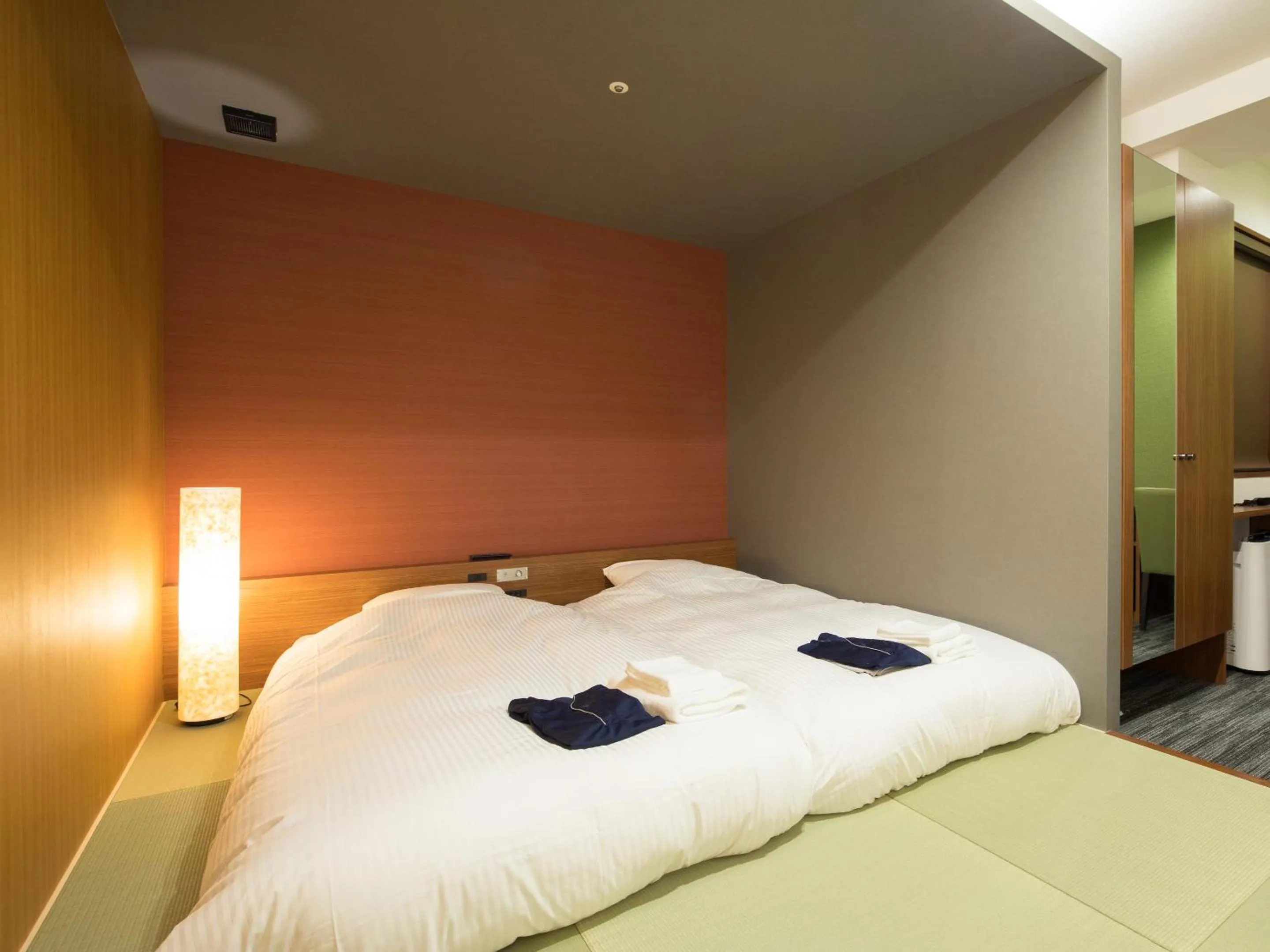 Bed in Gardens Cabin