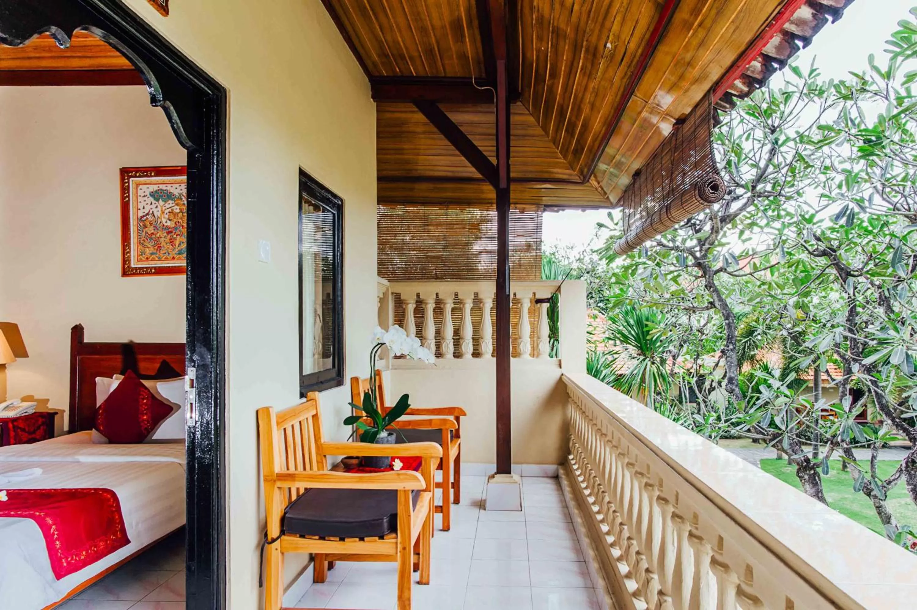 Balcony/Terrace, Bed in Kuta Puri Bungalows, Villas and Resort