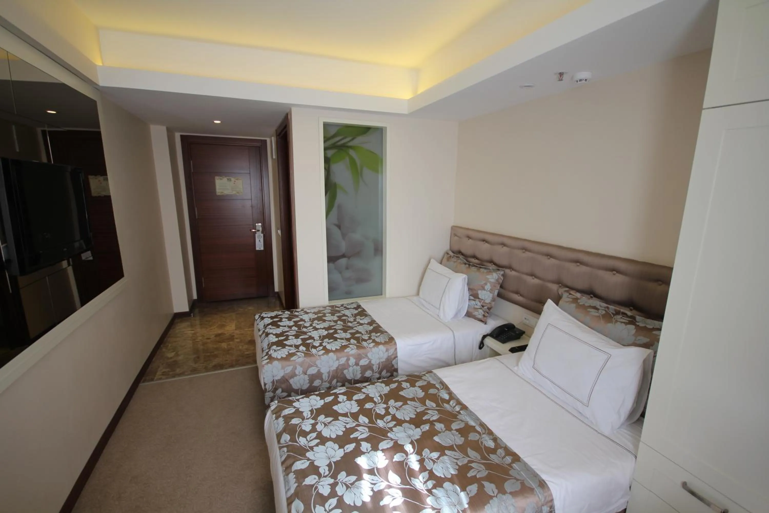 Bed in Grand Washington Hotel