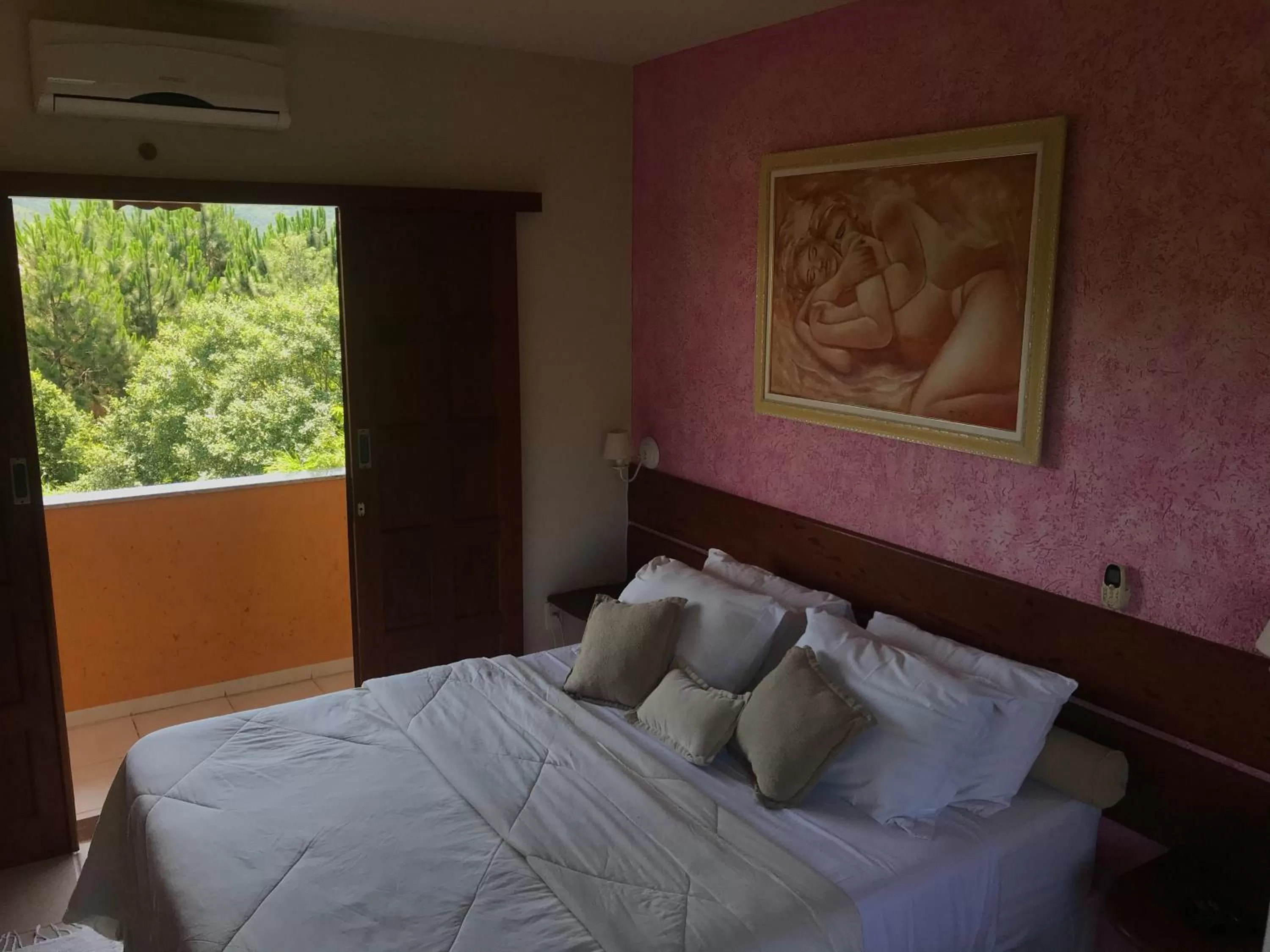 Bed in Pousada Ilha dos Anjos