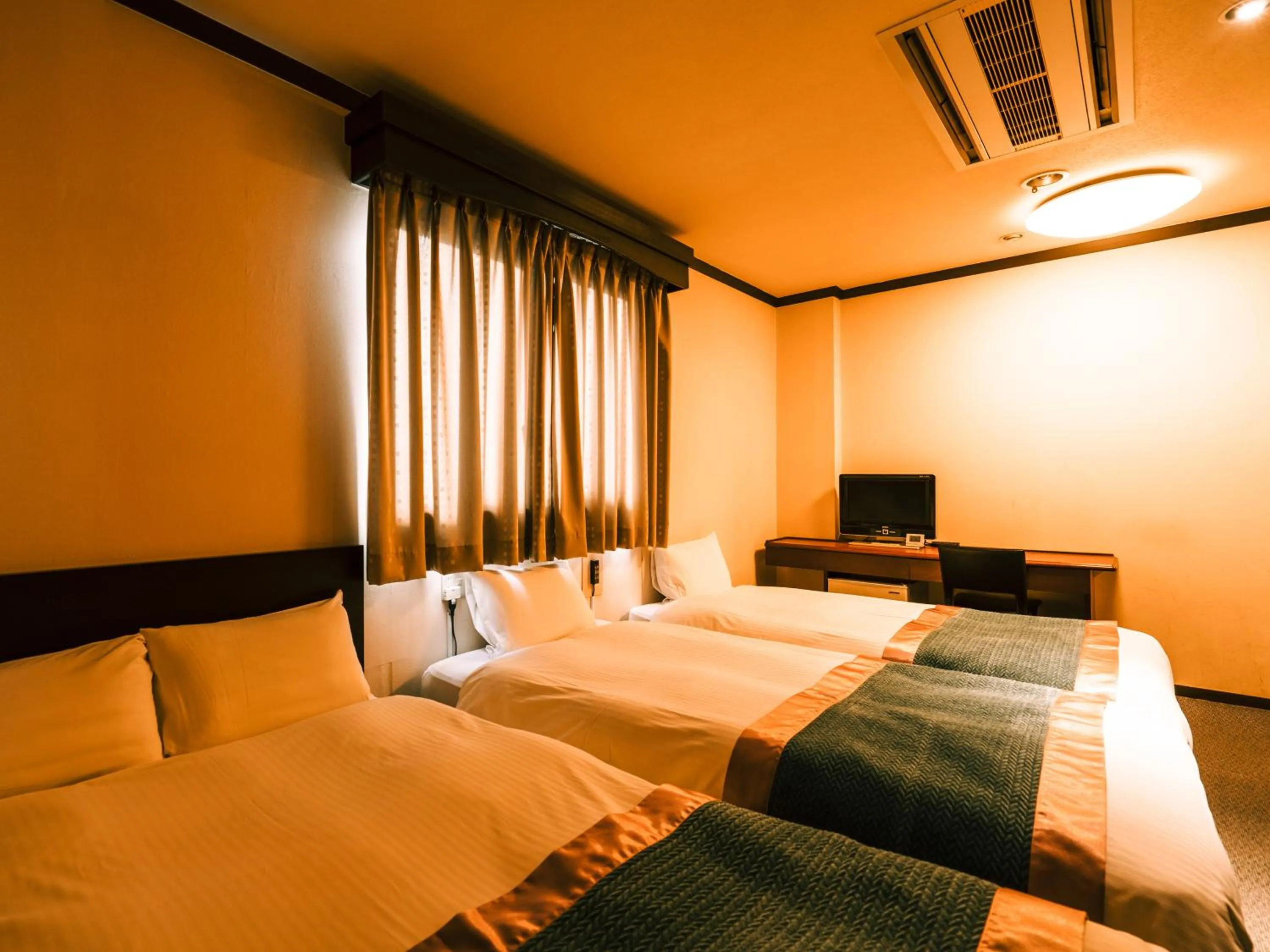 Photo of the whole room, Bed in Hotel AreaOne Takamatsu