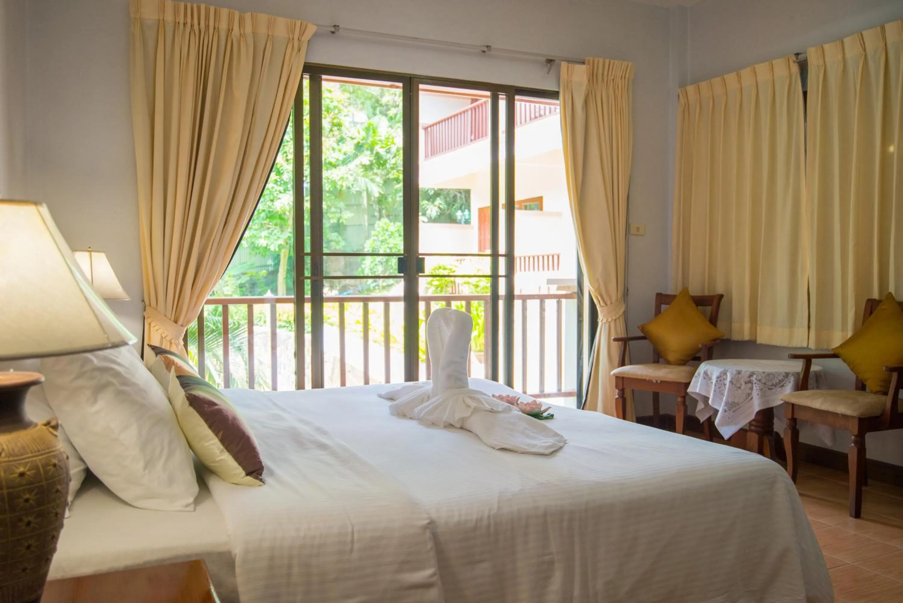 Photo of the whole room, Bed in Kata Interhouse Resort by Haii Collection