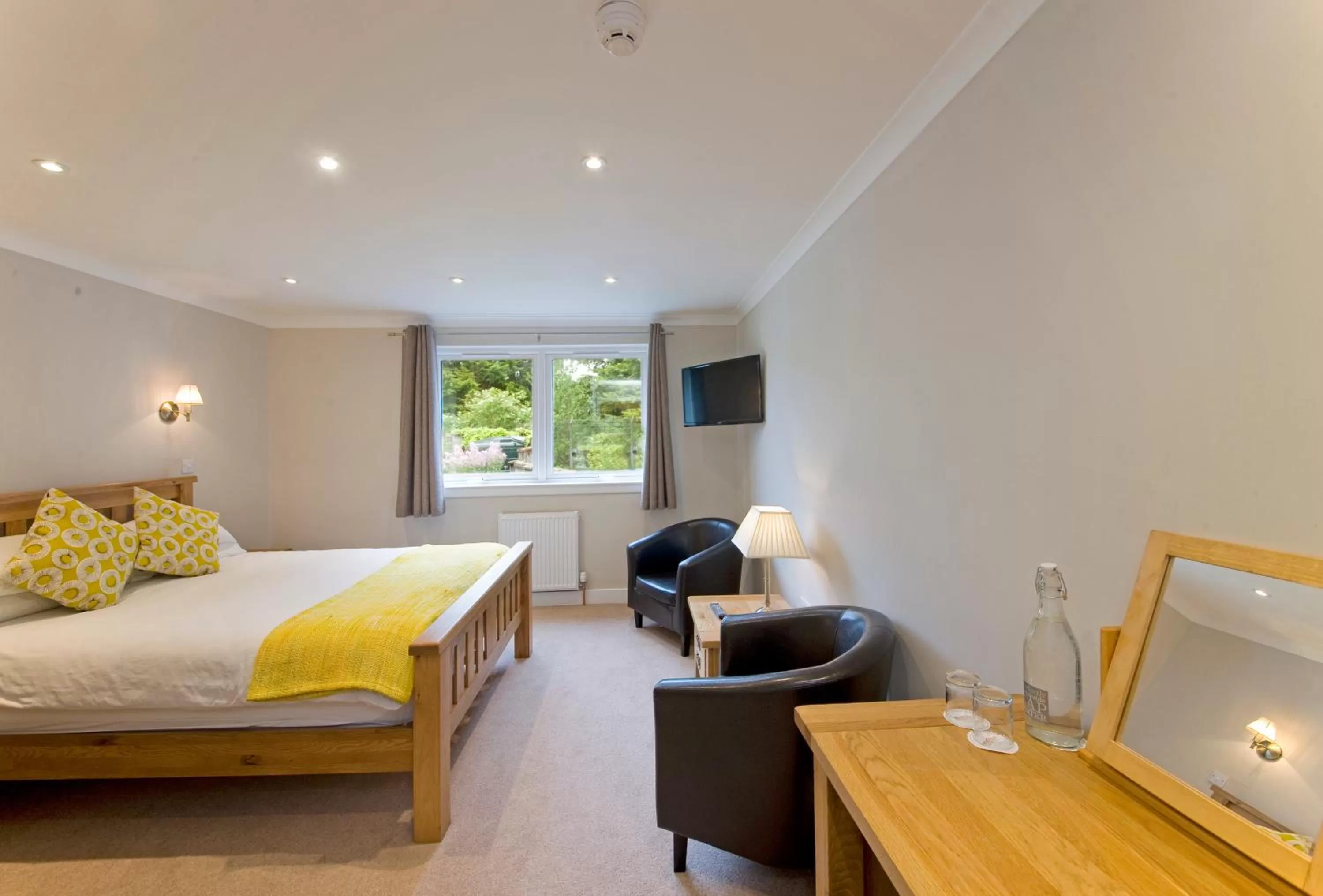 Photo of the whole room, Bed in Falls of Lora Hotel