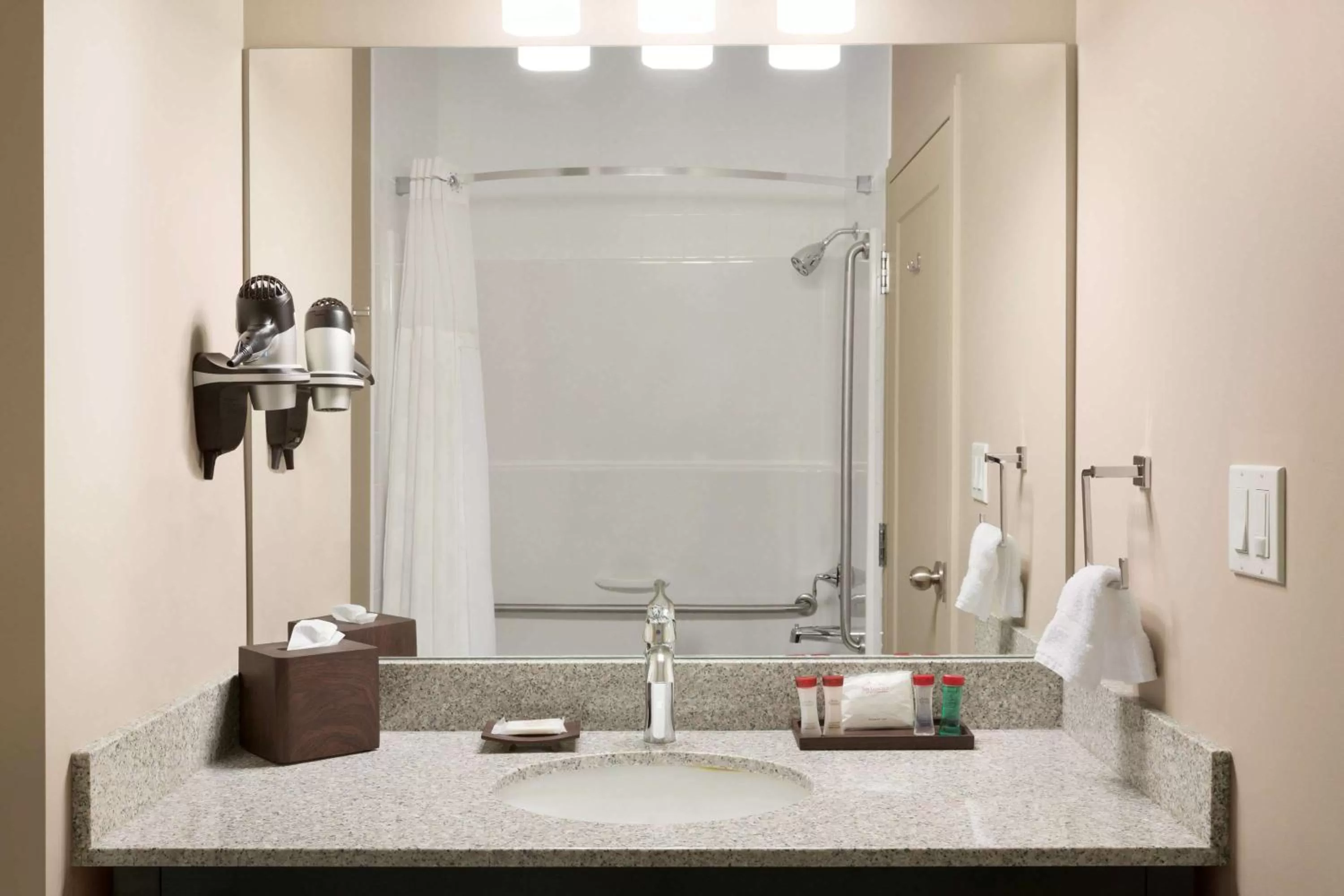Bathroom in Ramada by Wyndham Emerald Park/Regina East