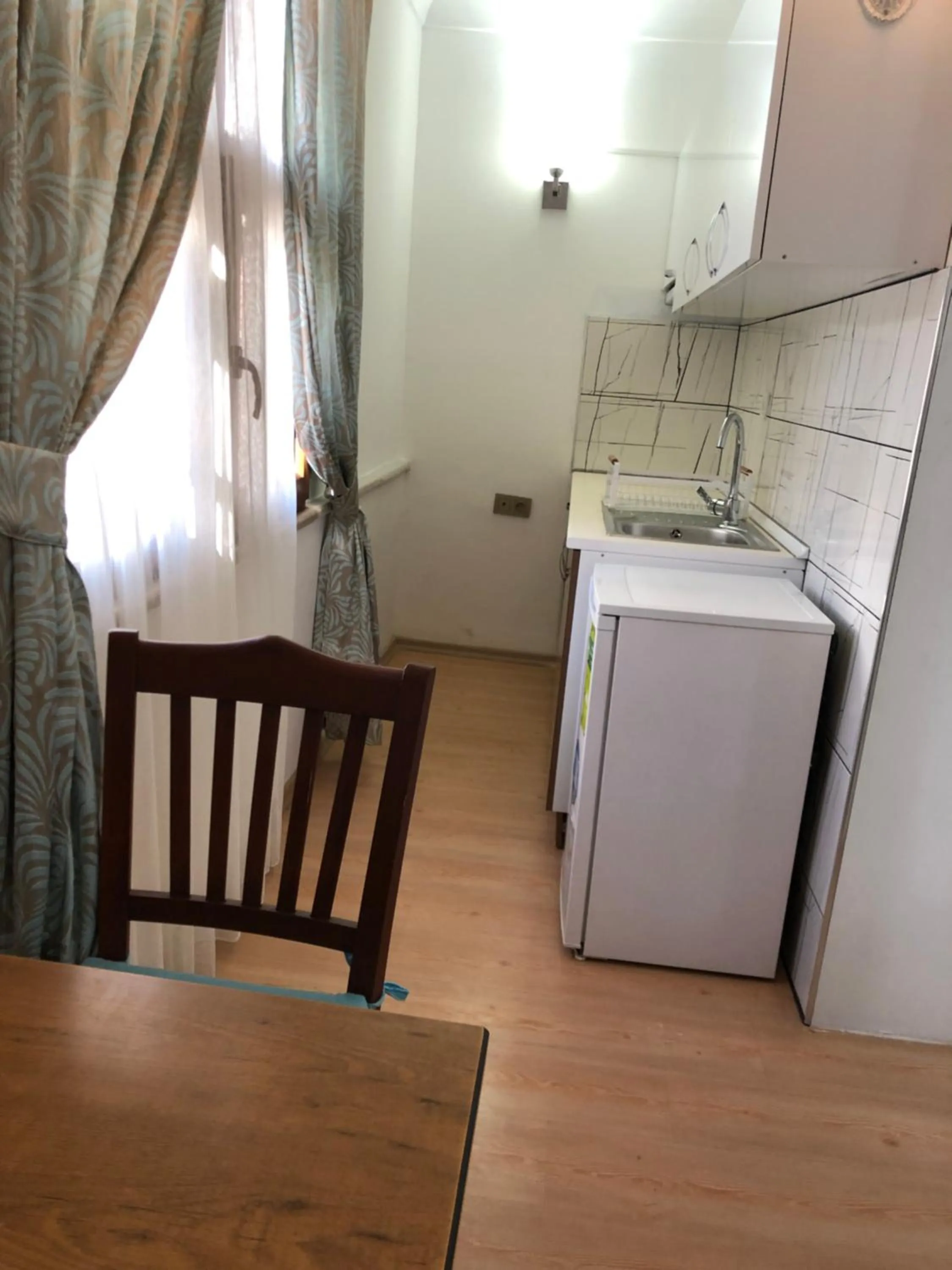 Kitchen or kitchenette in Urcu Hotel