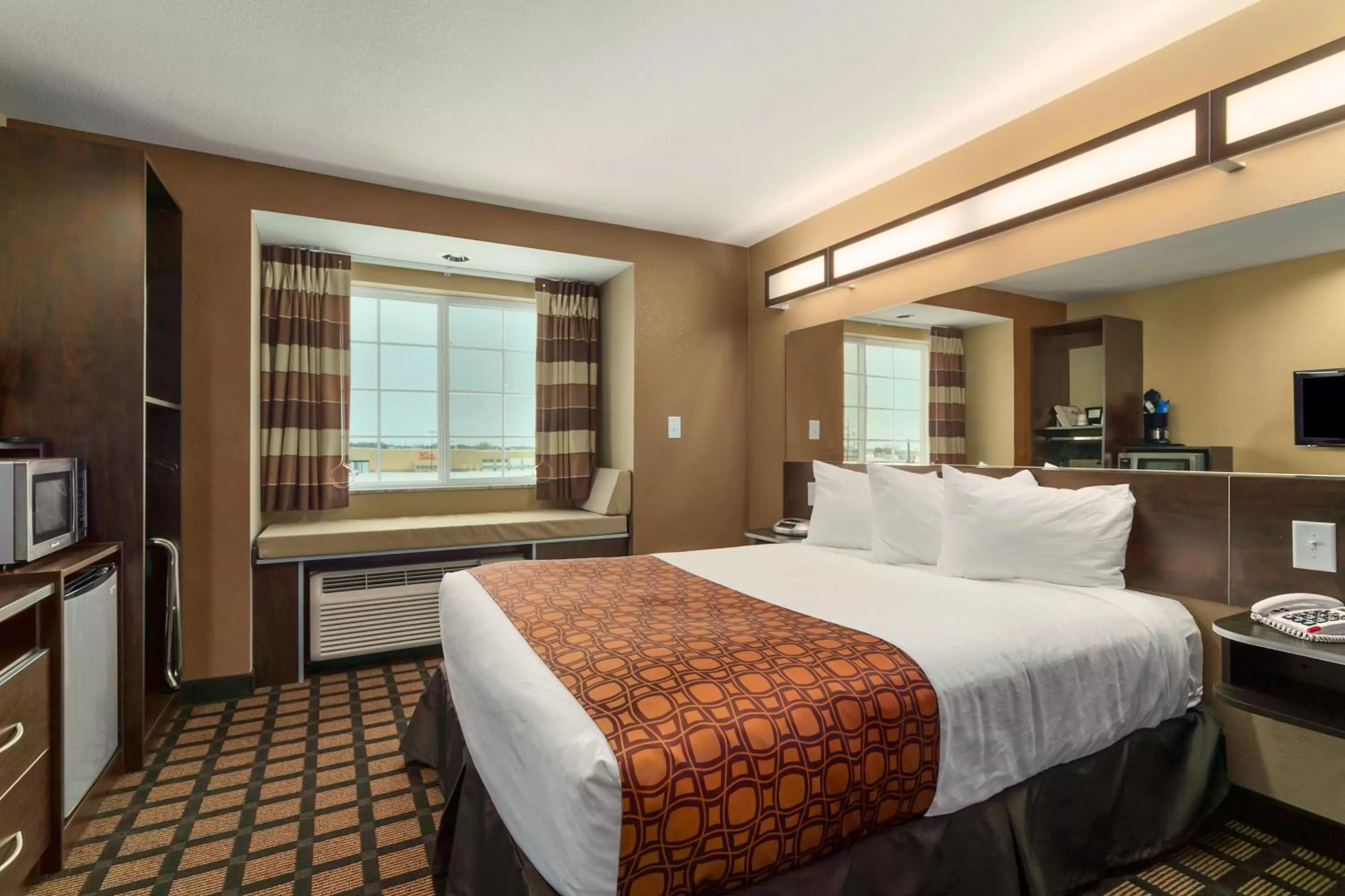 TV and multimedia, Bed in Microtel Inn & Suites by Wyndham Williston