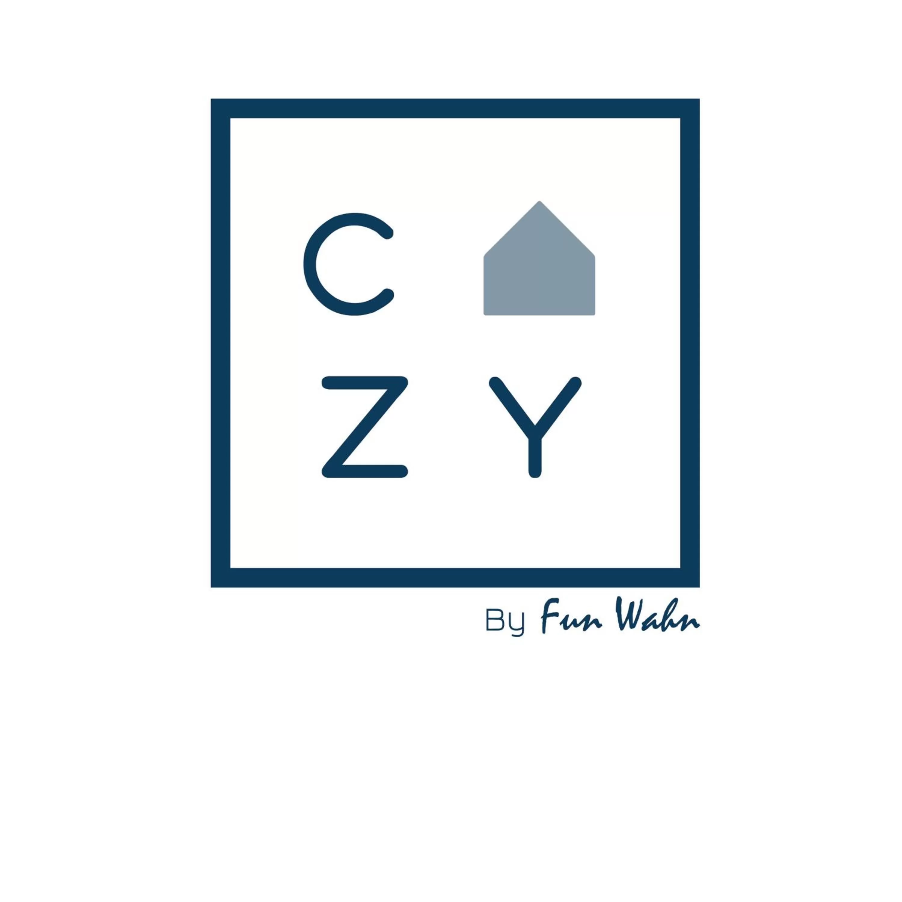 Property logo or sign in Cozy by Funwahn