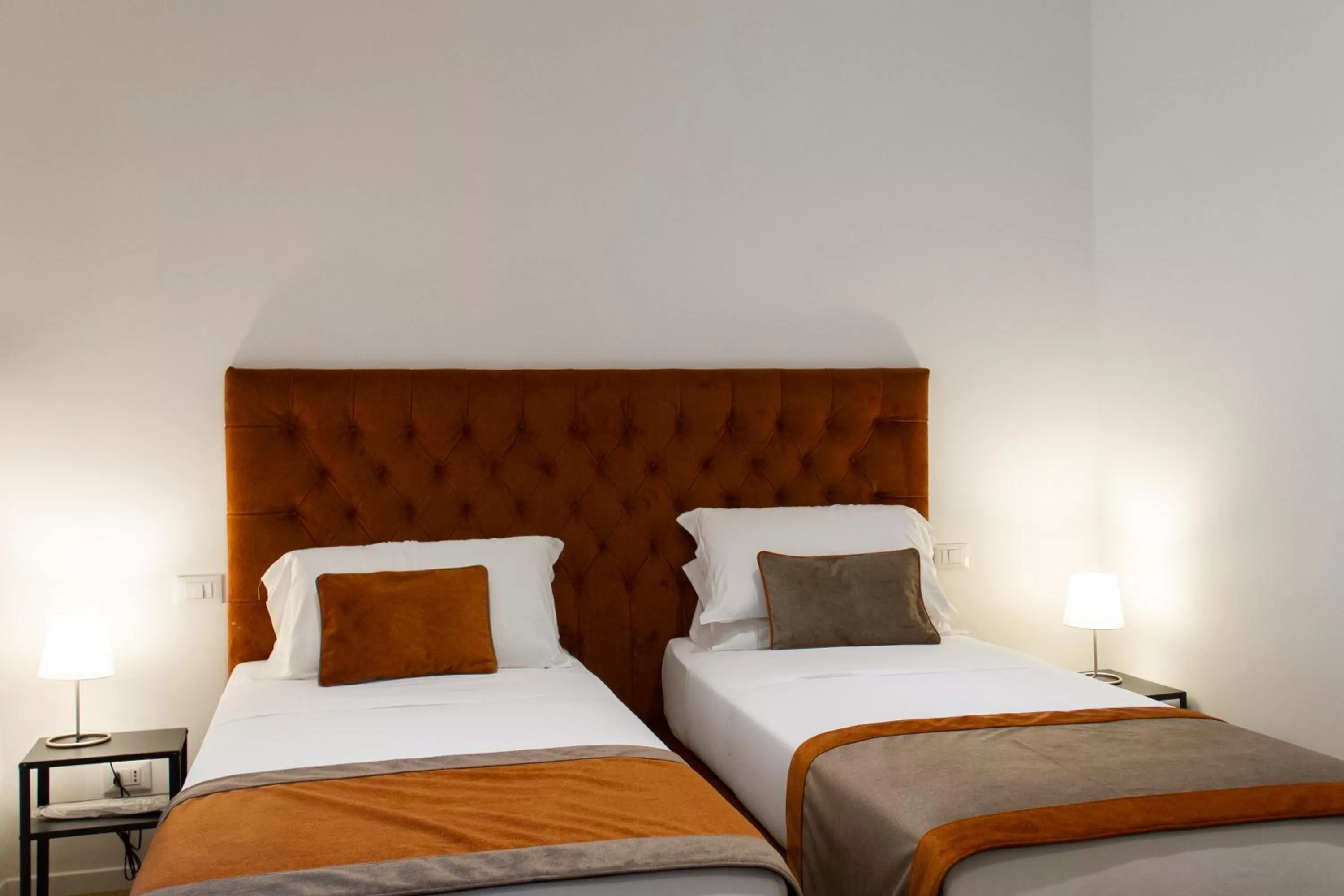 Bed in Michelangelo Vatican Rooms