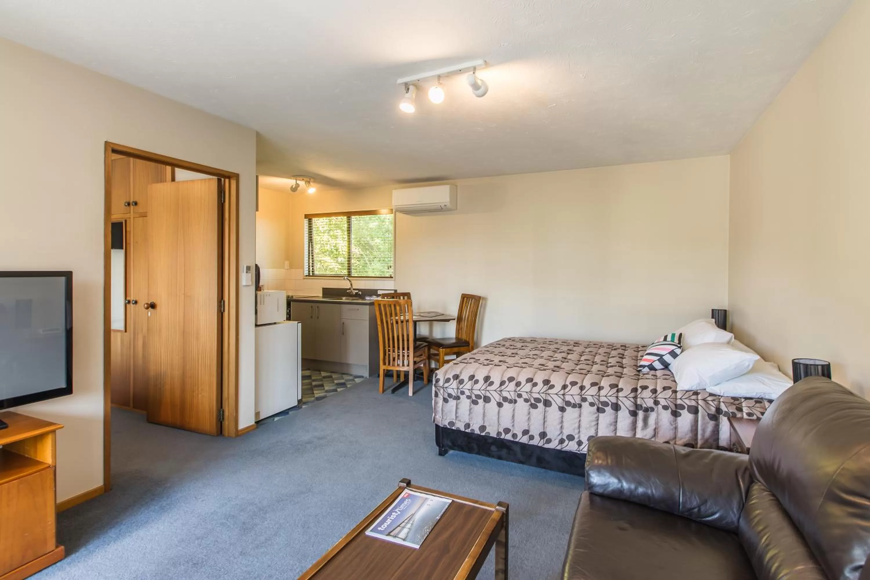 Living room in Argyle On The Park - Central Christchurch Motel Overlooking Hagley Park