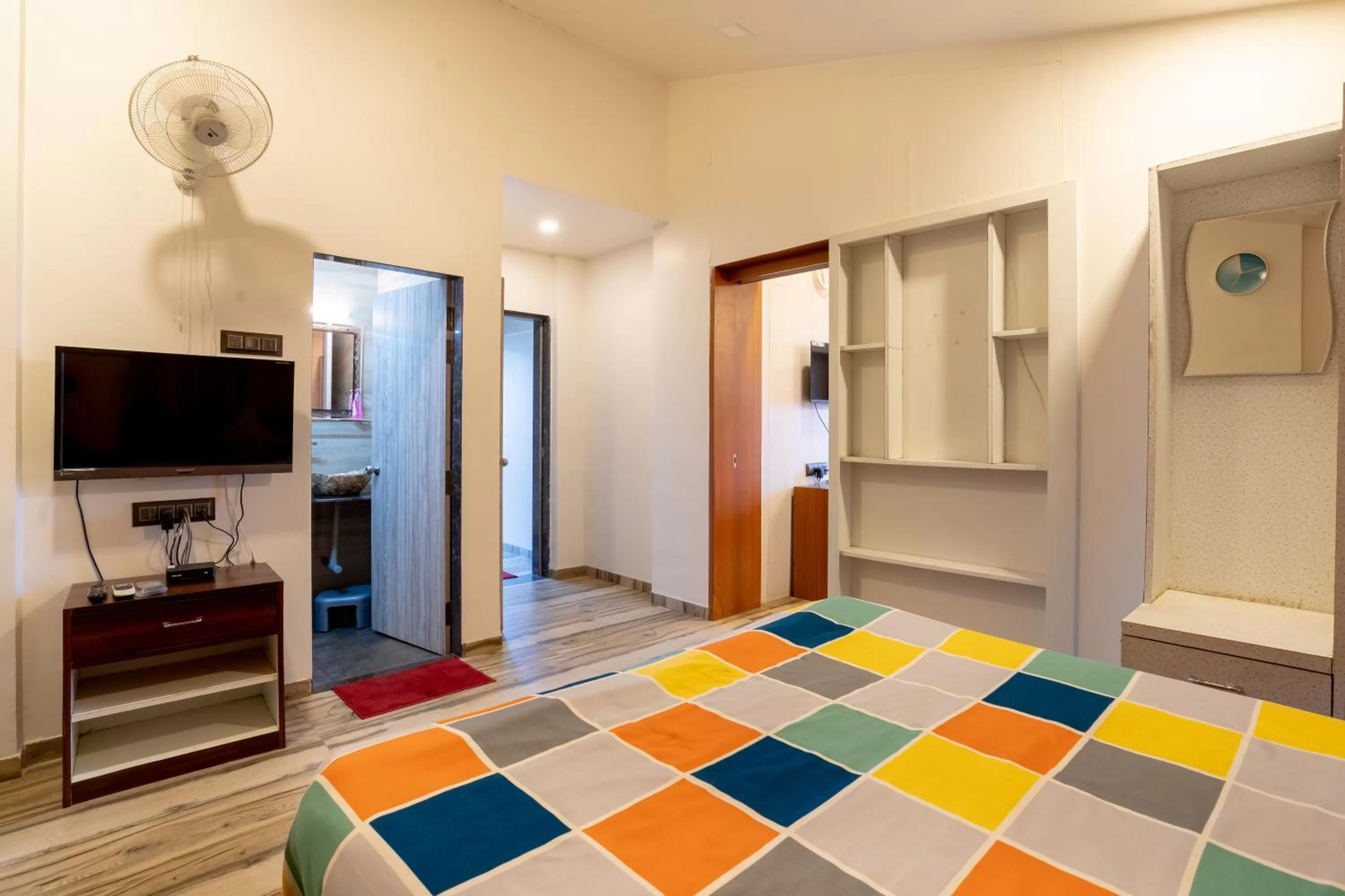 Bed, TV/Entertainment Center in Pooja Villa Suites-Rooms and Pool, Igatpuri