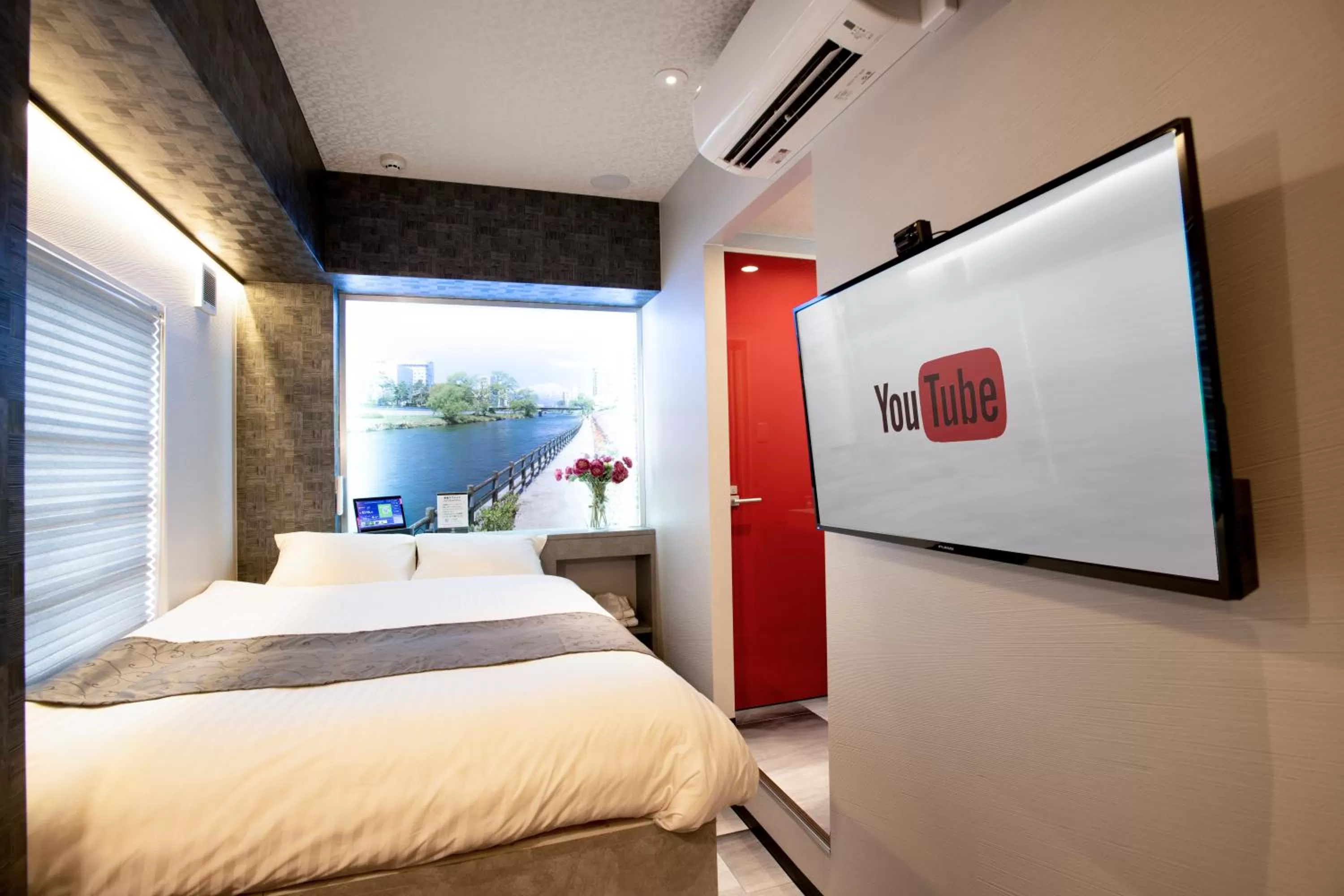 Photo of the whole room, Bed in Hotel Xcell Hiroshima Nagarekawa