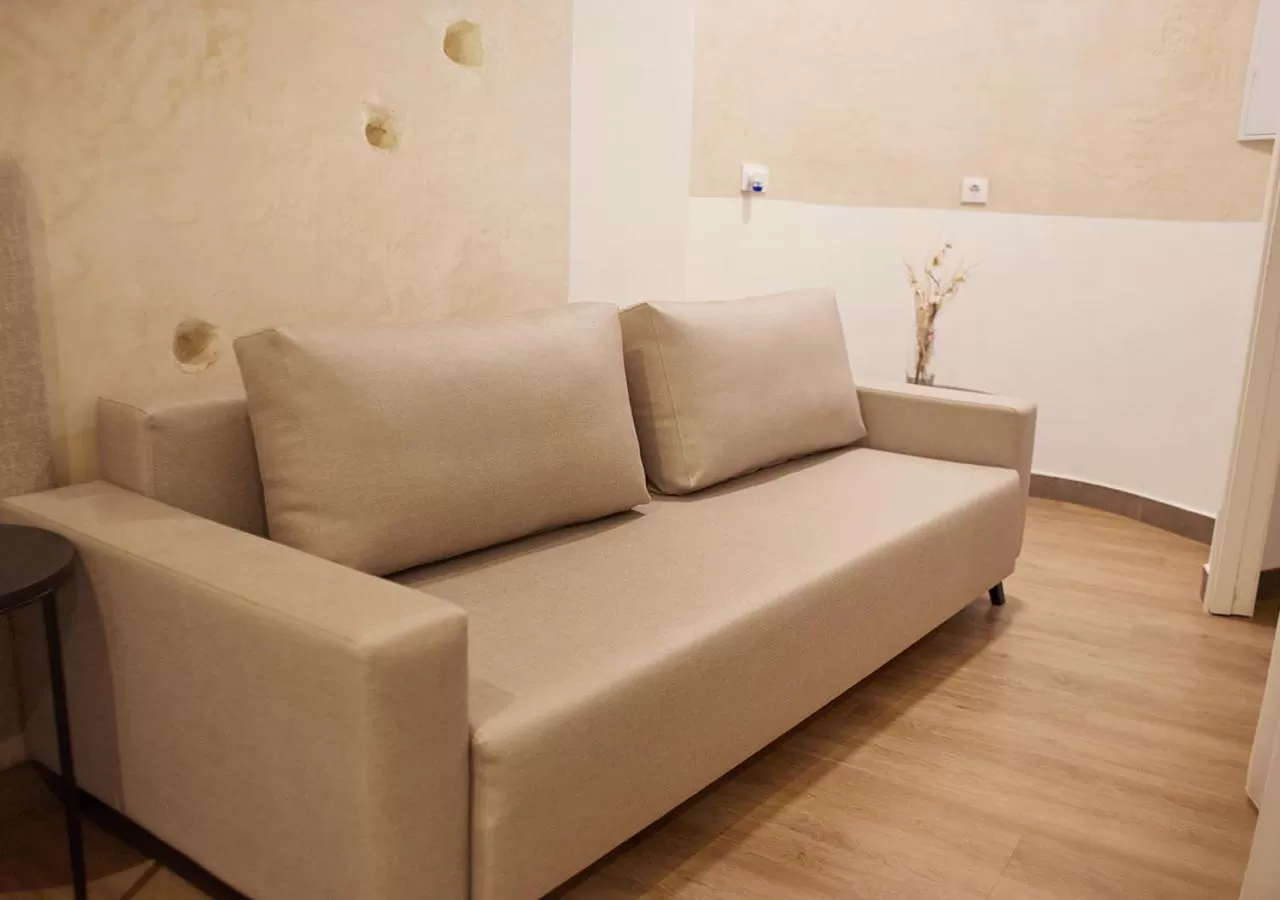 Seating area in ISA Sevilla Suites
