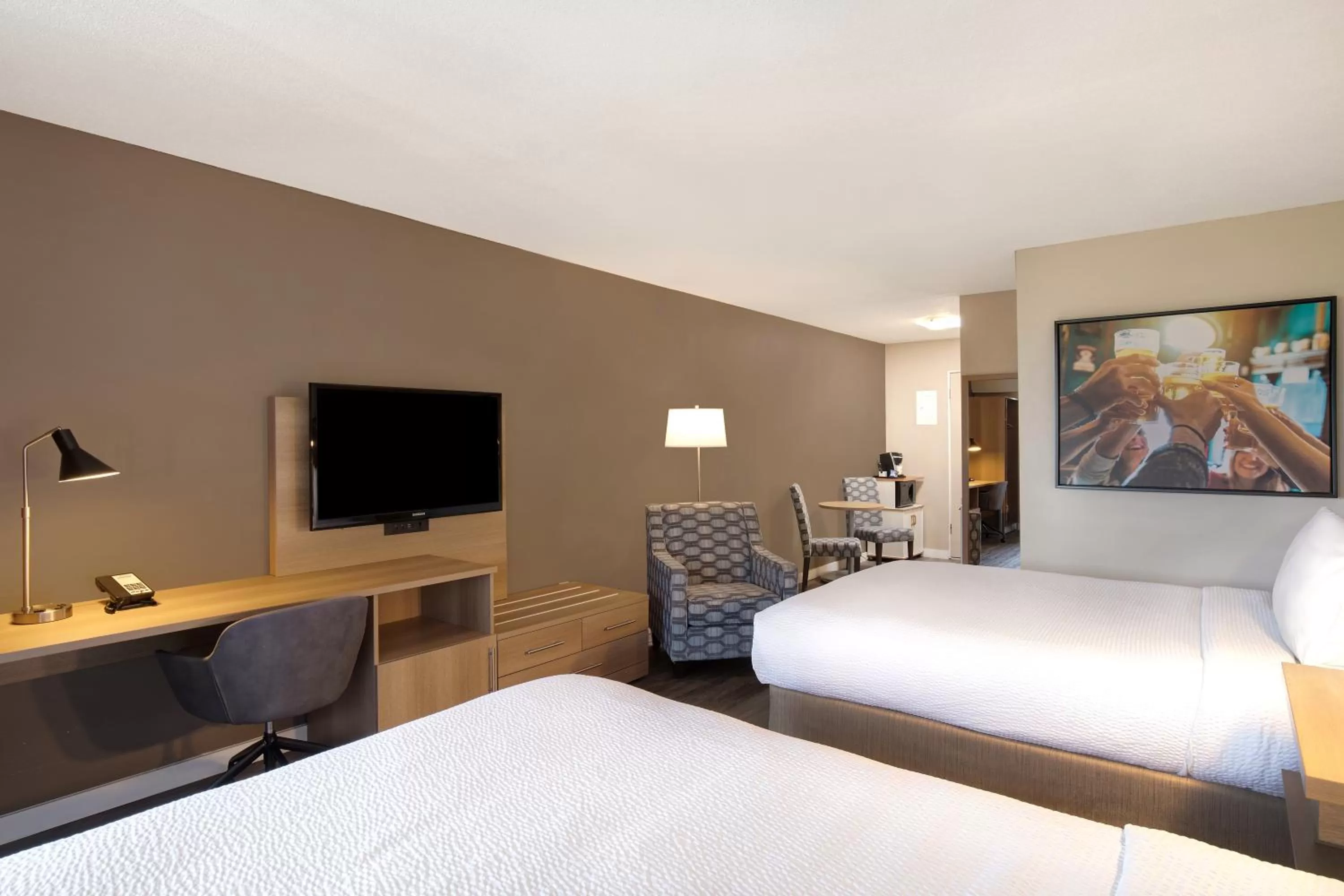 Seating area, Bed in Days Inn by Wyndham Victoria Uptown