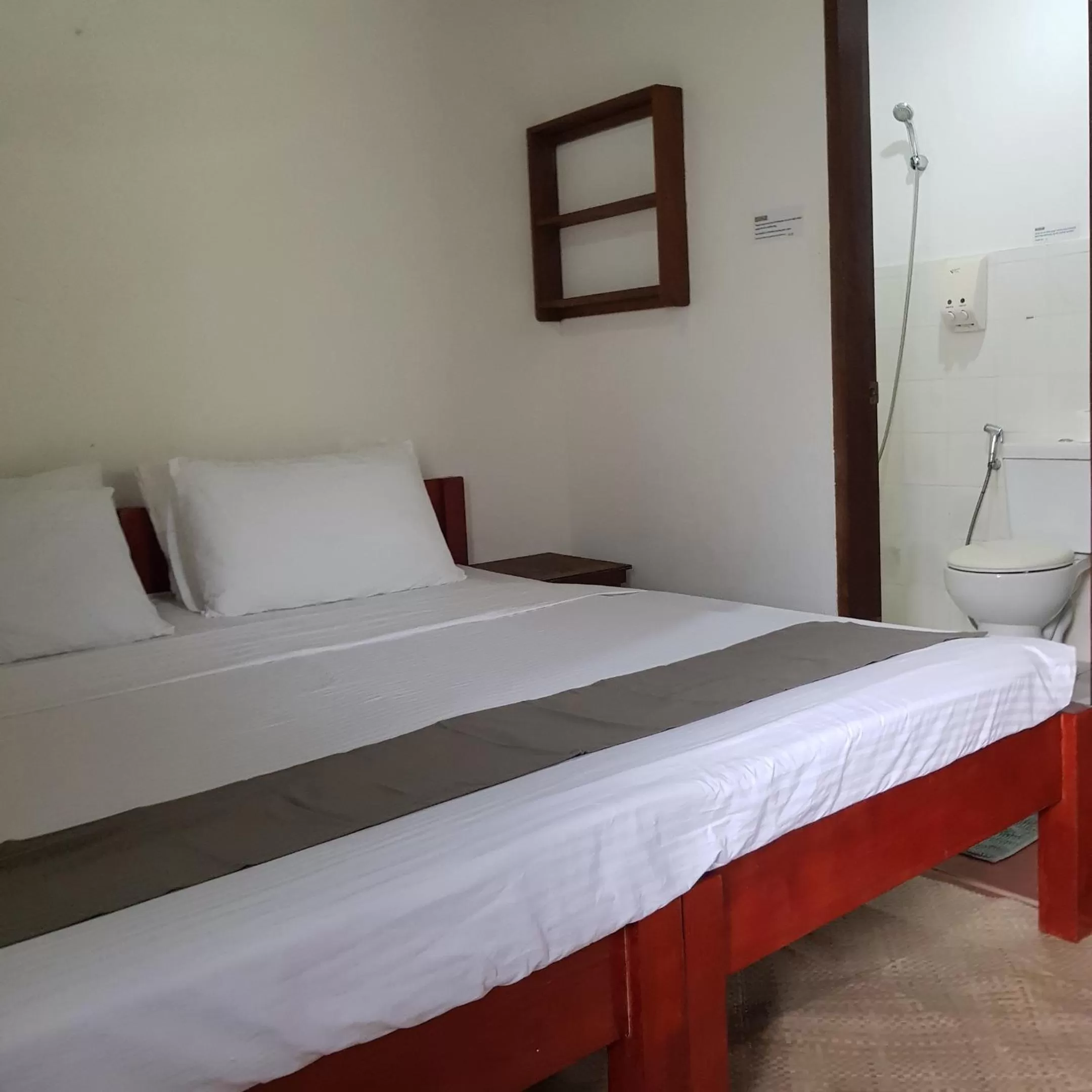 Bed in Golden Monkey Beach Hotel