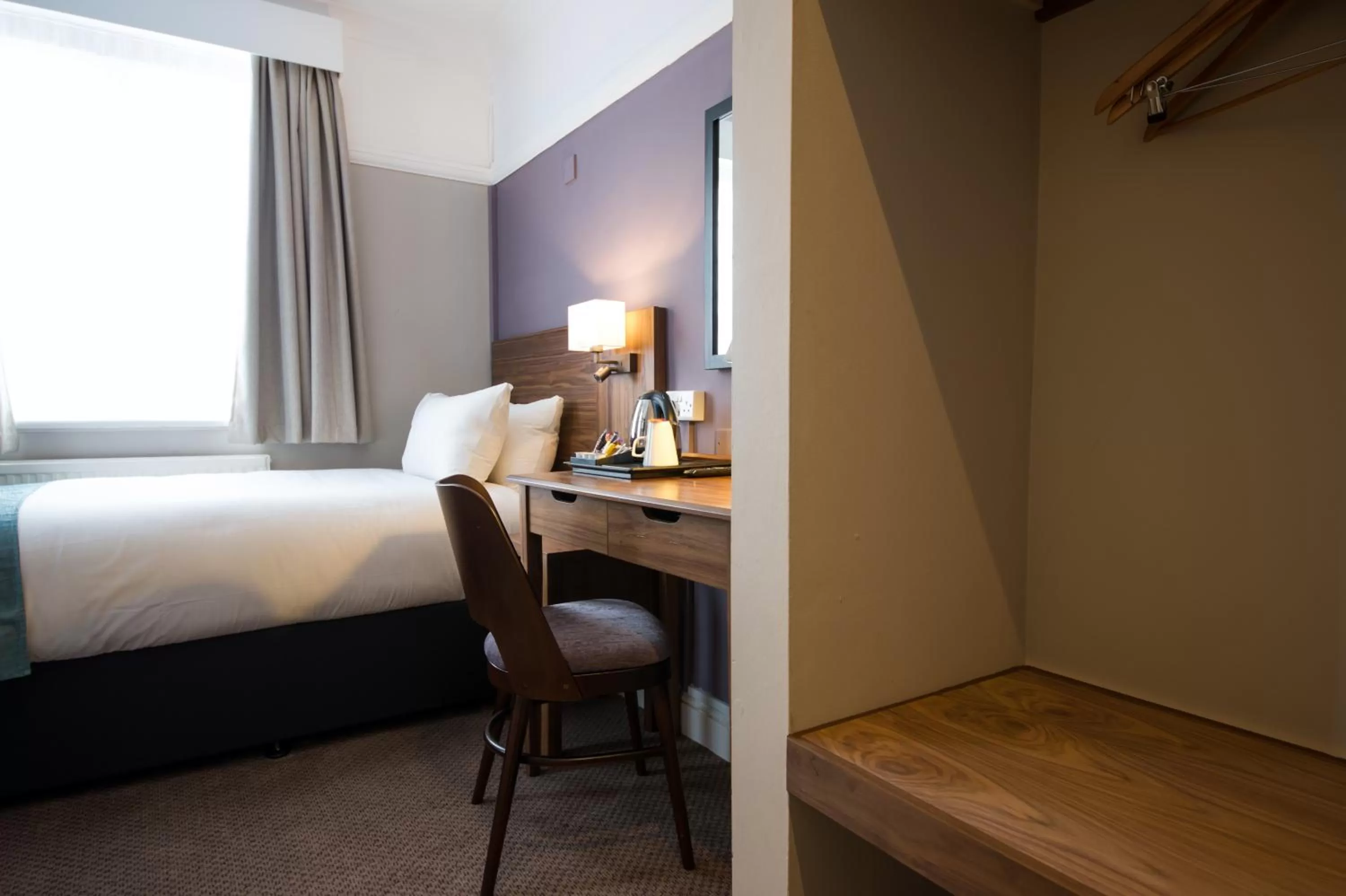 Bed, TV/Entertainment Center in The Railway by Innkeeper's Collection