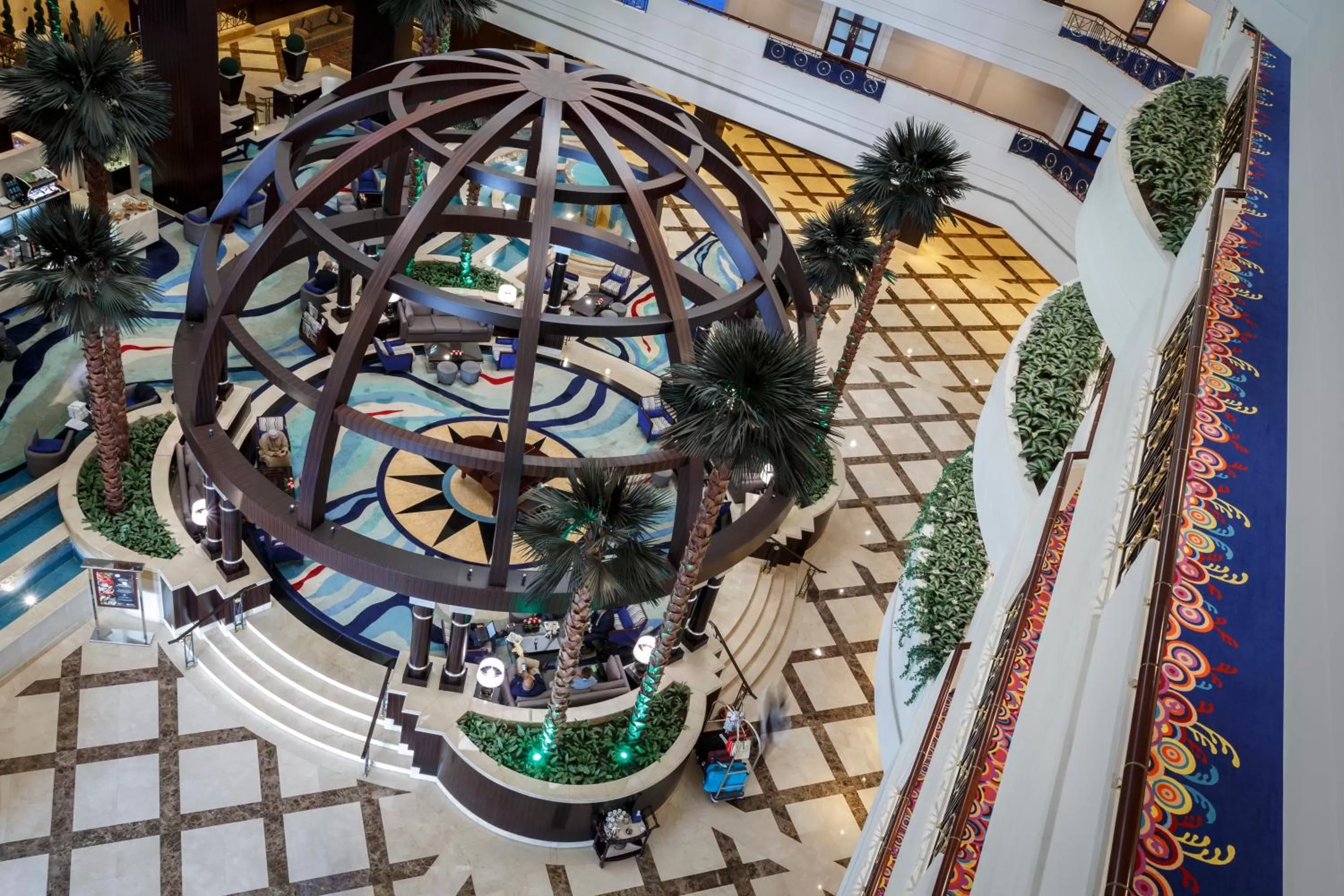 Lobby or reception in Mövenpick Grand Al Bustan