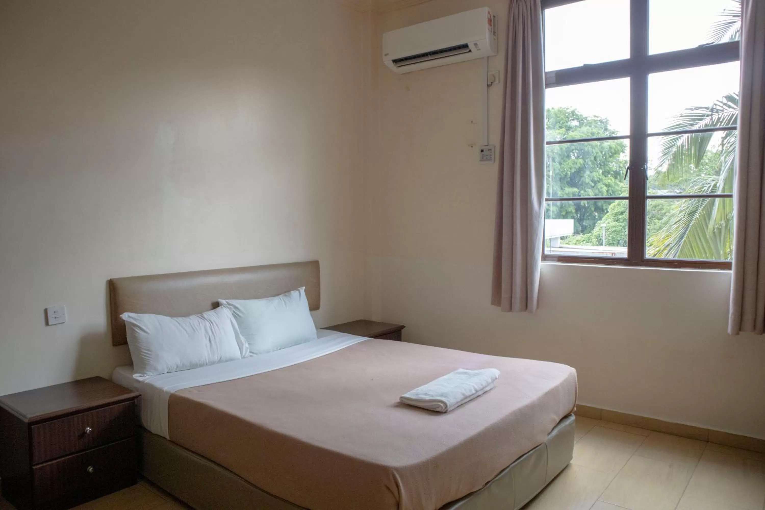 Bed in Hotel Wangsamas