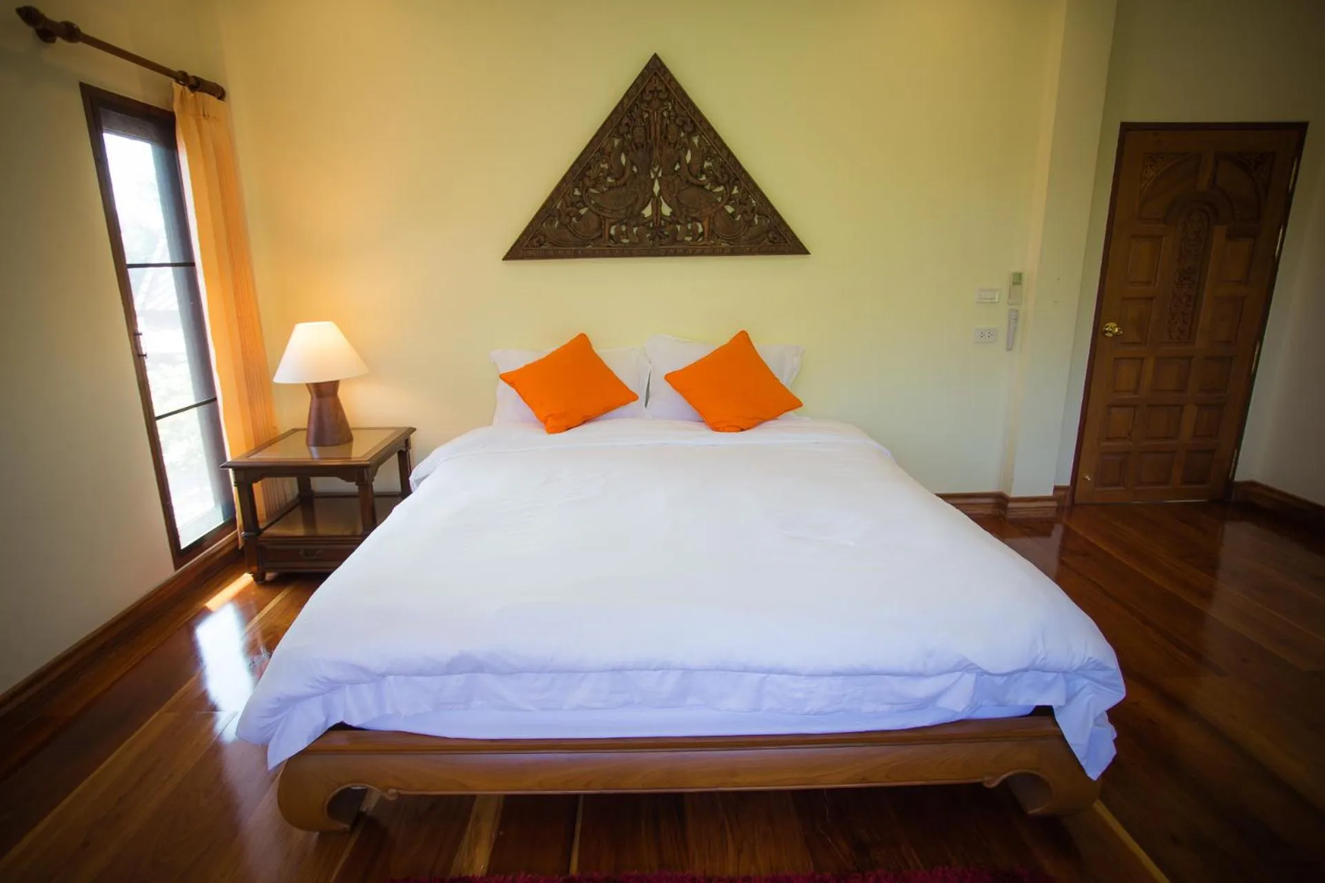 Bed in Thararin Villa