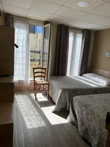 Bed in Hôtel Jarry Confort