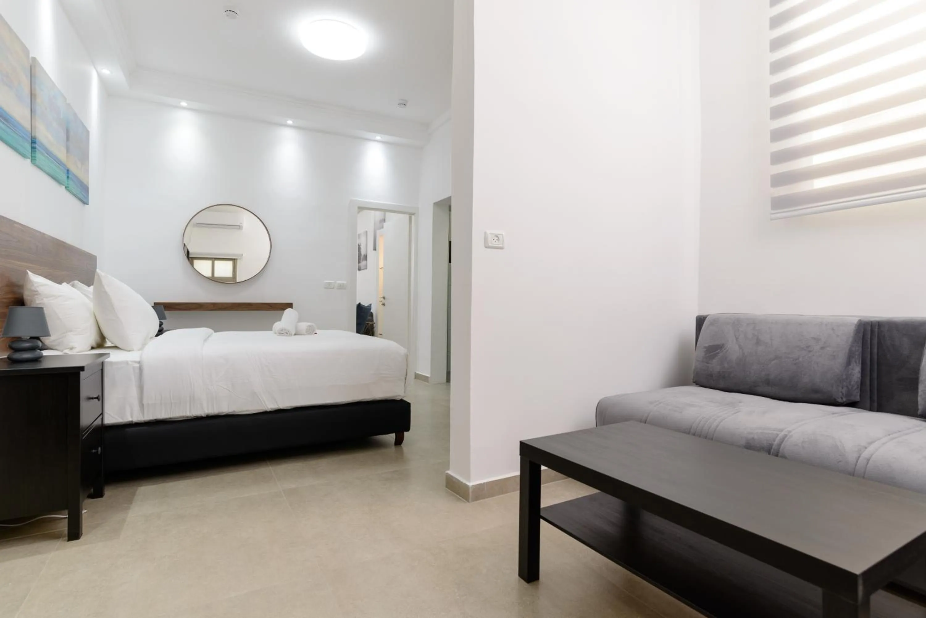 Photo of the whole room, Bed in Liber Tel Aviv Sea Shore Suites BY RAPHAEL HOTELS