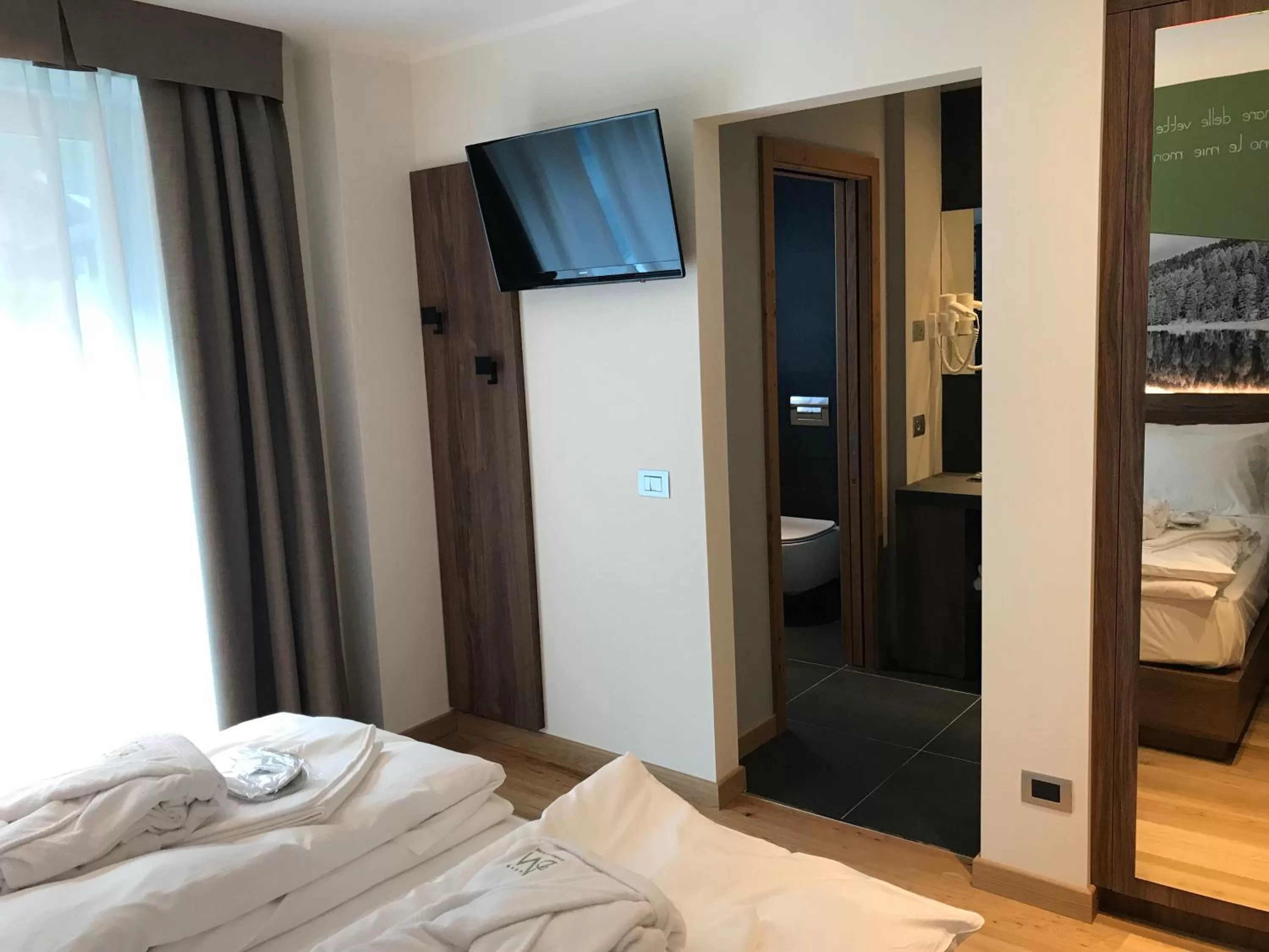 Decorative detail, Bed in Dolomeet Boutique Hotel