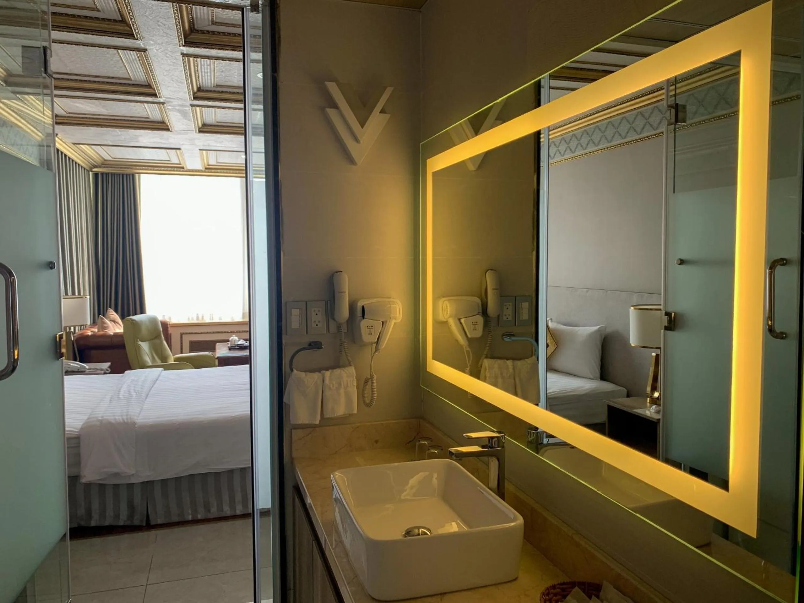 Bathroom, Bed in Lotus Saigon Hotel