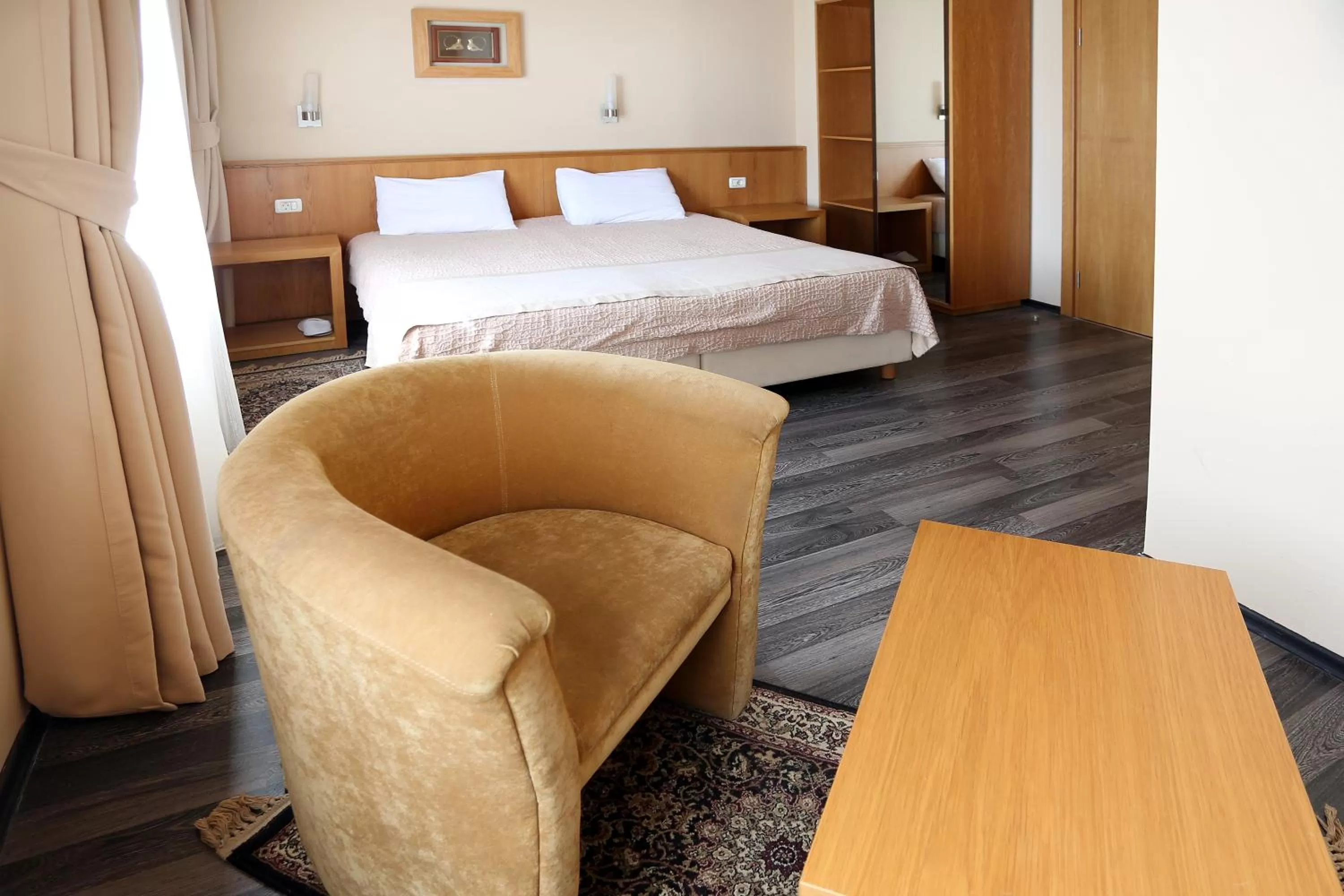 Seating area, Bed in Hotel Lirak