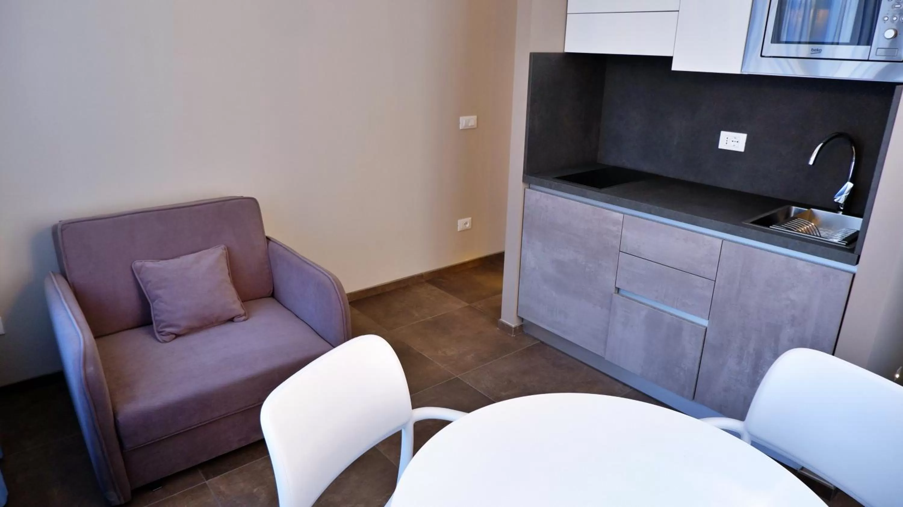 Kitchen/Kitchenette in Pianomare Riviera Apartments and Rooms