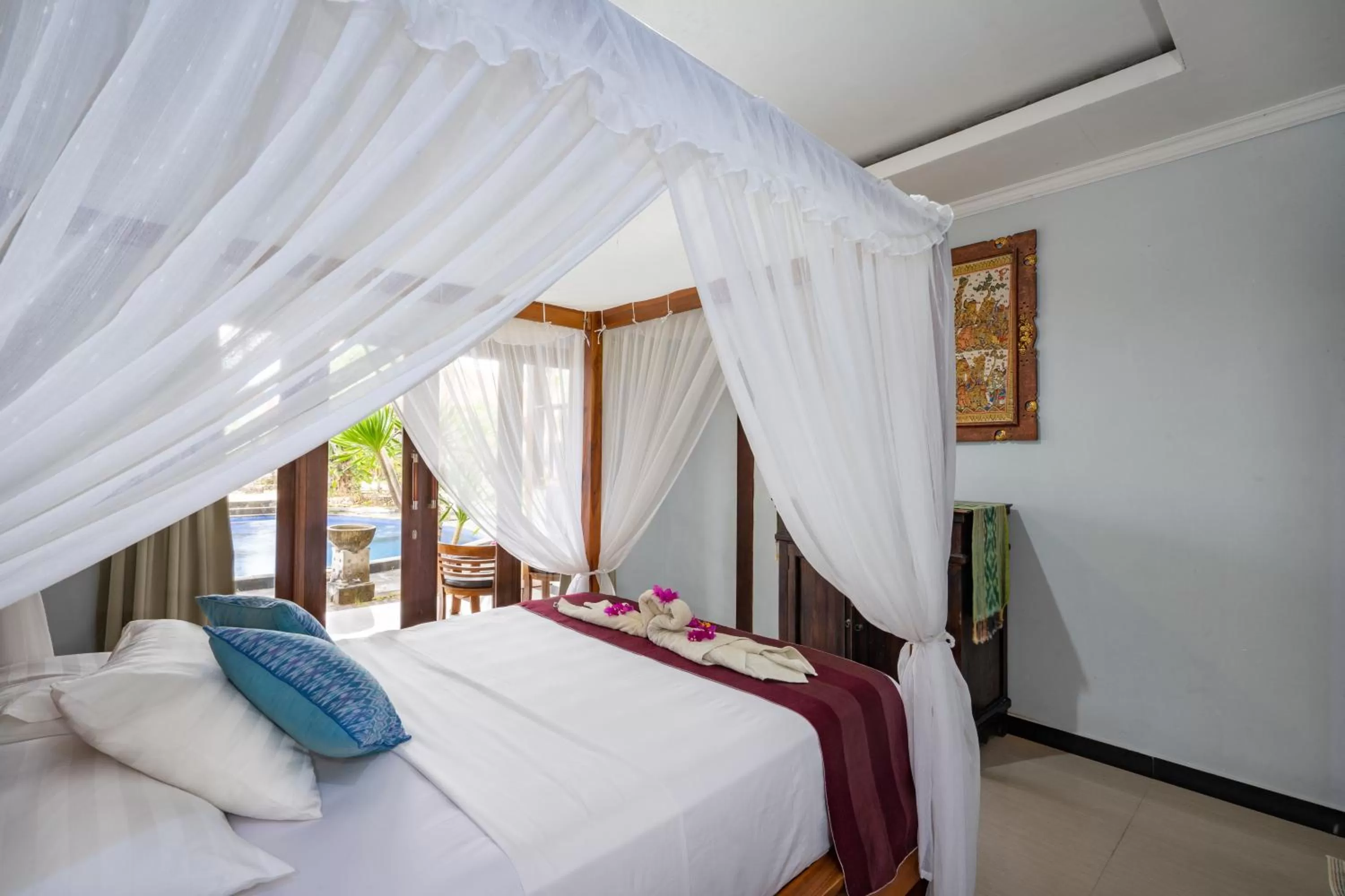 Bed in Mushroom Beach Bungalows