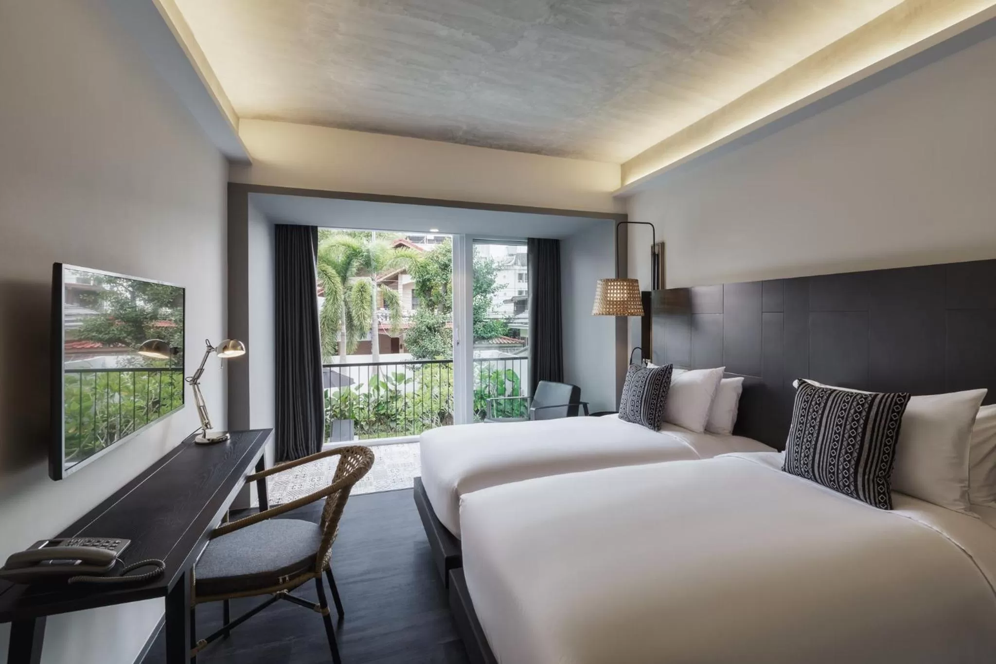 Bed in KIRI HOTEL Chiang Mai