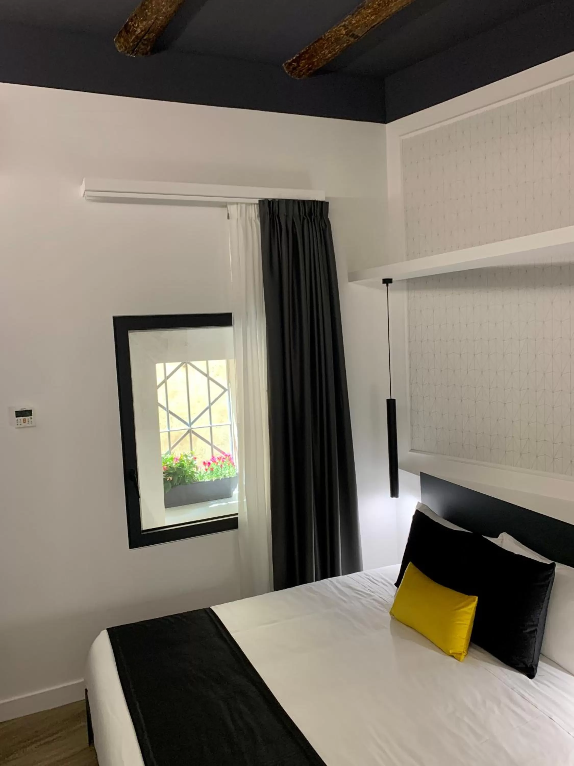 Bedroom, Bed in Toledo Boutique Rooms