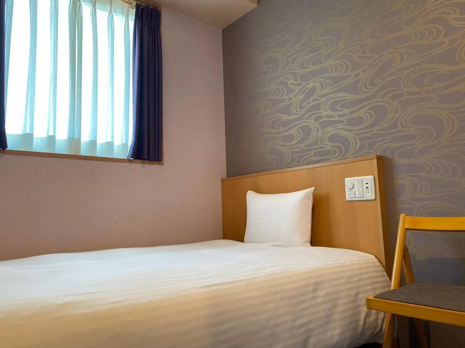 Bed in SAKURA SKY HOTEL KASHIWA(桜スカイホテル柏)