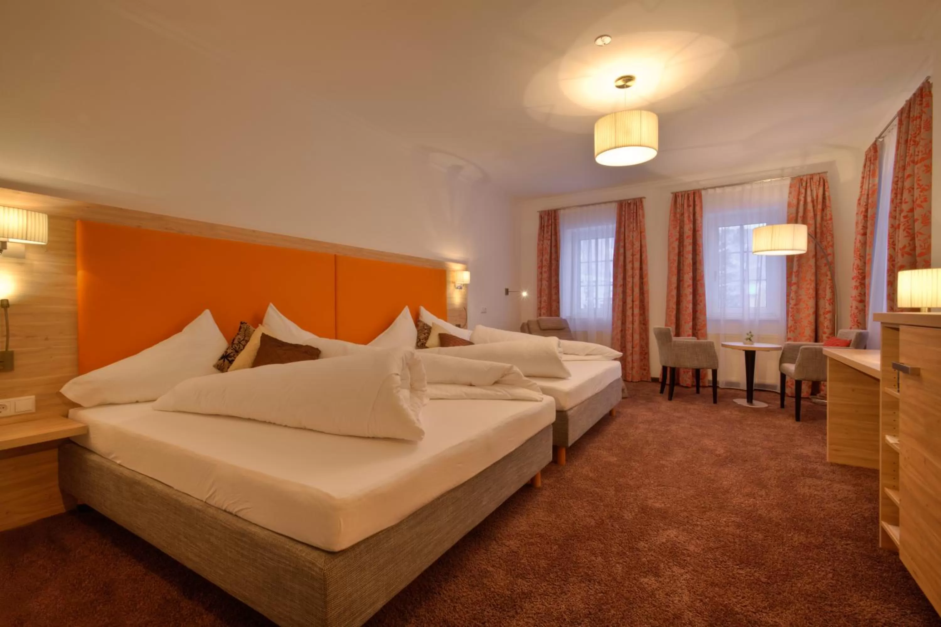 Bed in Wohlfühlhotel Goiserer Mühle