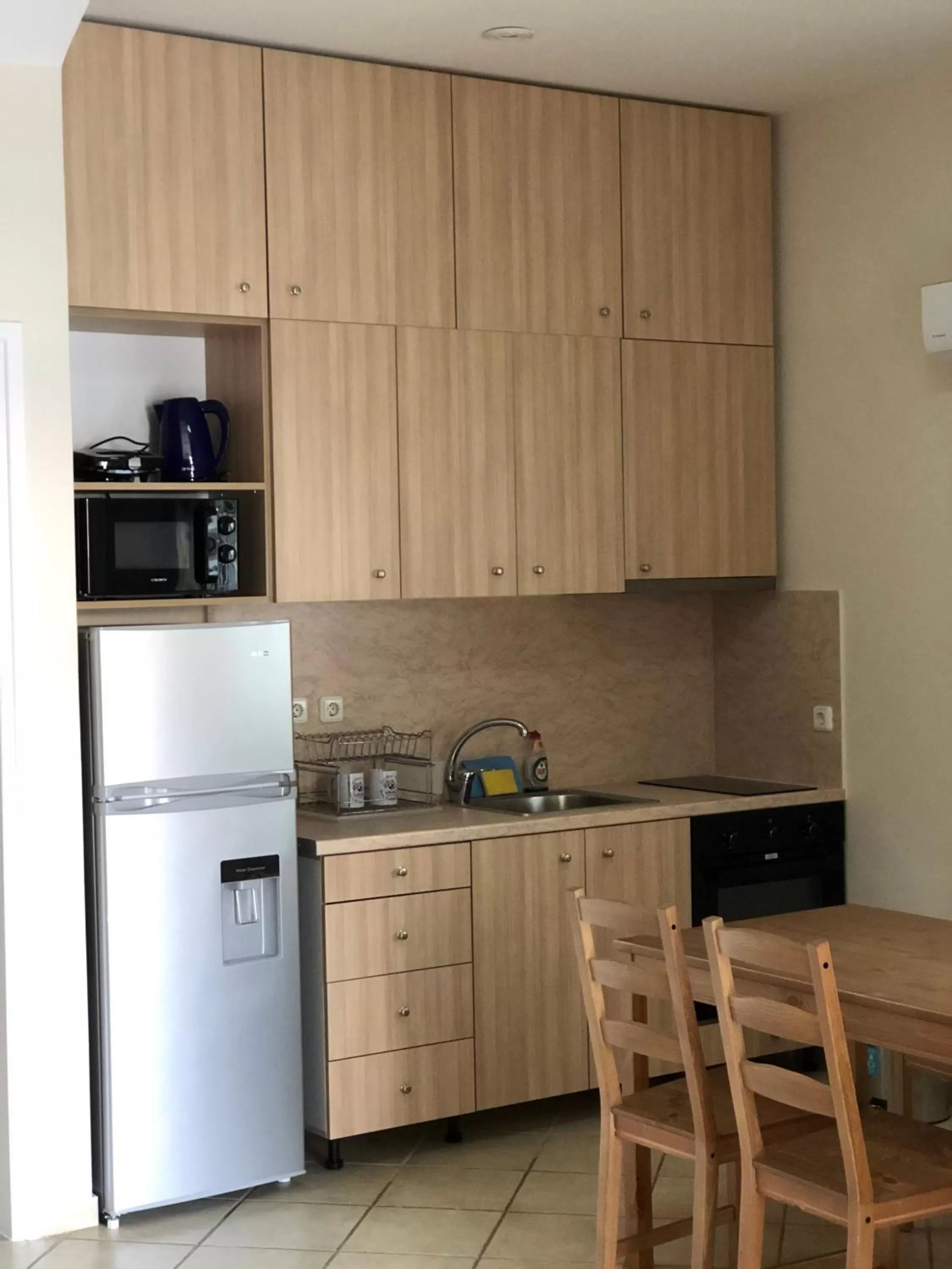 Kitchen or kitchenette in Corinthian Village