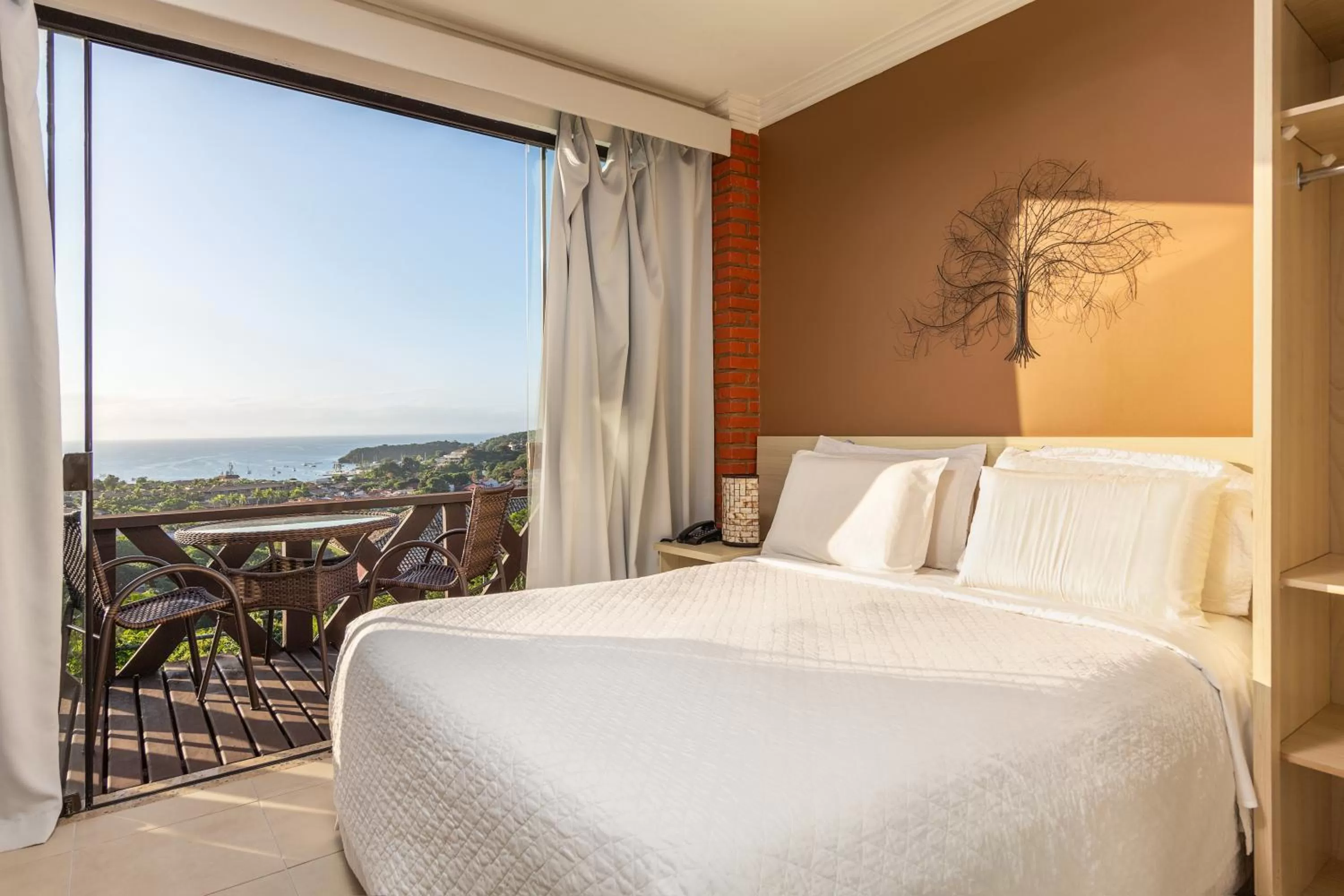 Balcony/Terrace, Bed in Costa do Sol Boutique Hotel