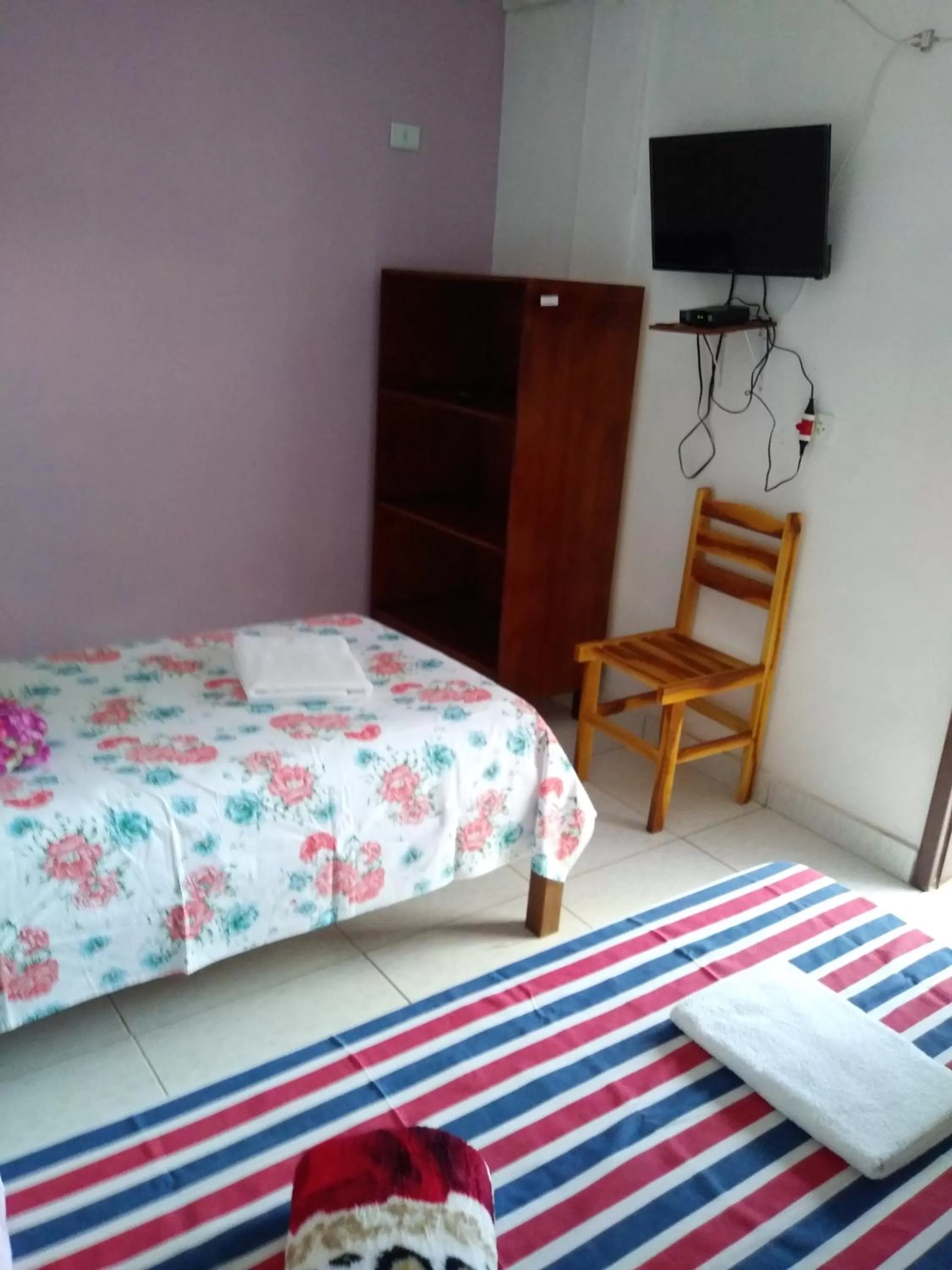 Bed in Pousada dos Ventos