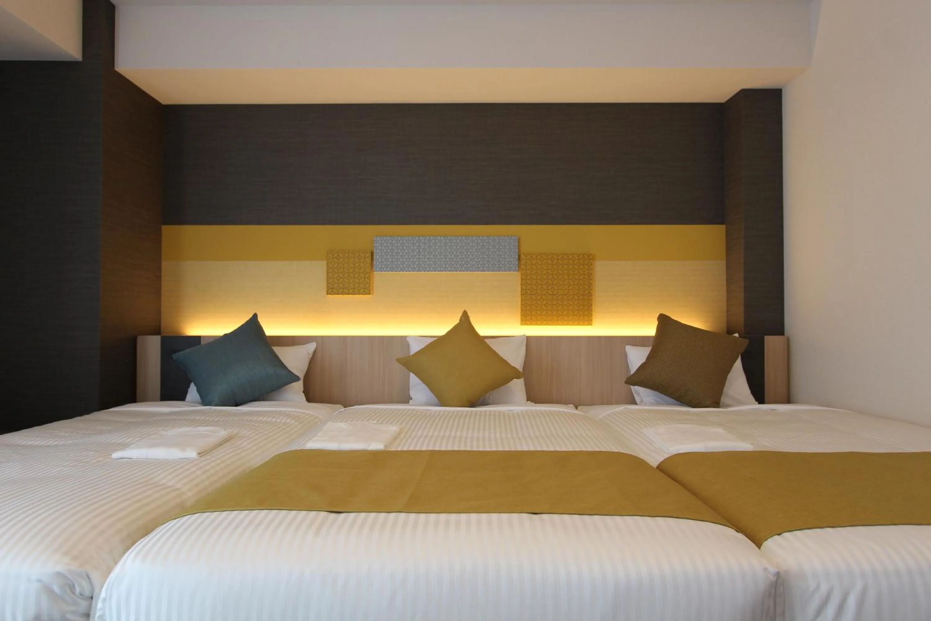 Bed in KOKO HOTEL Tsukiji Ginza