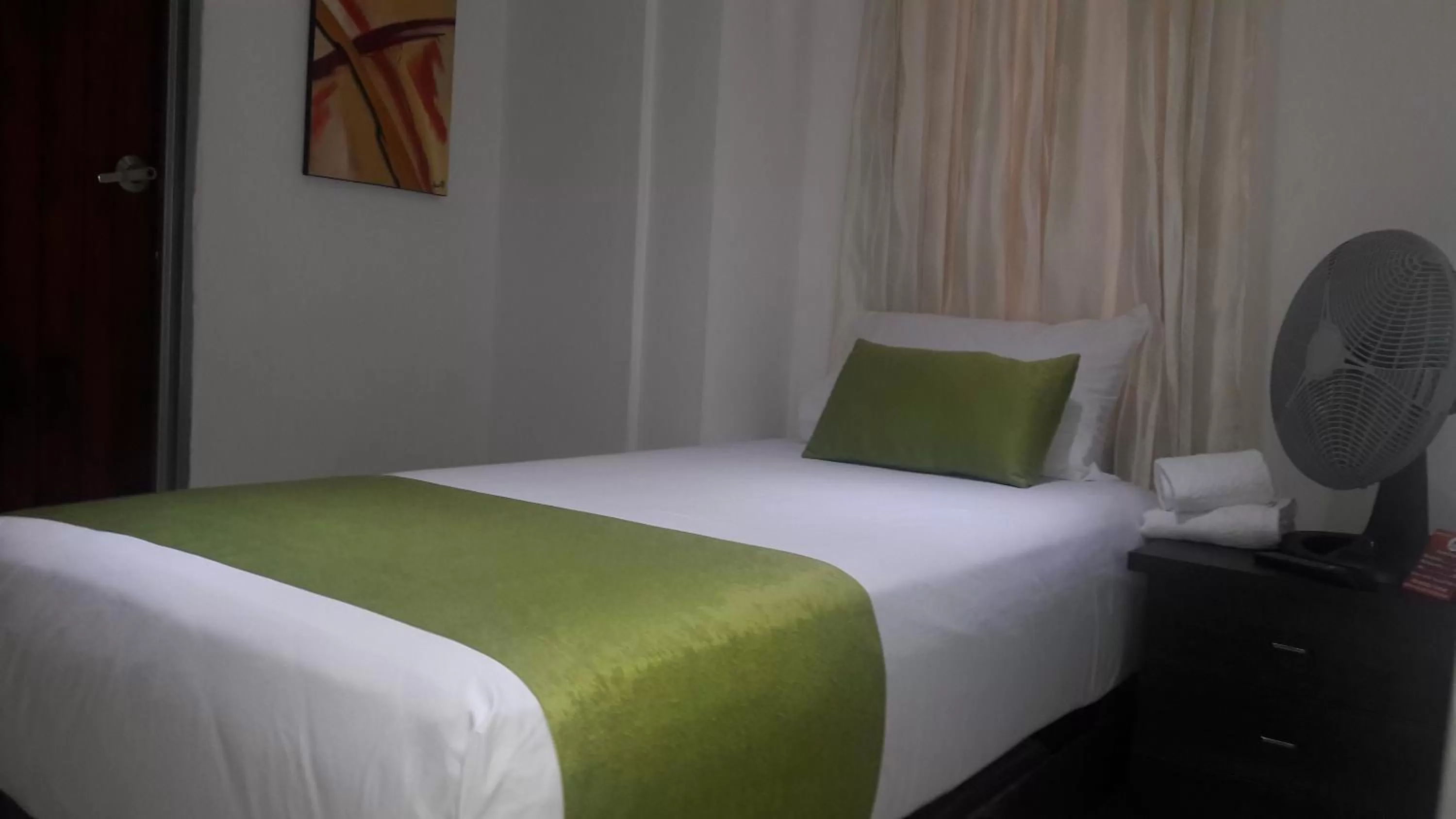 Bed in Hotel Cafe Plaza