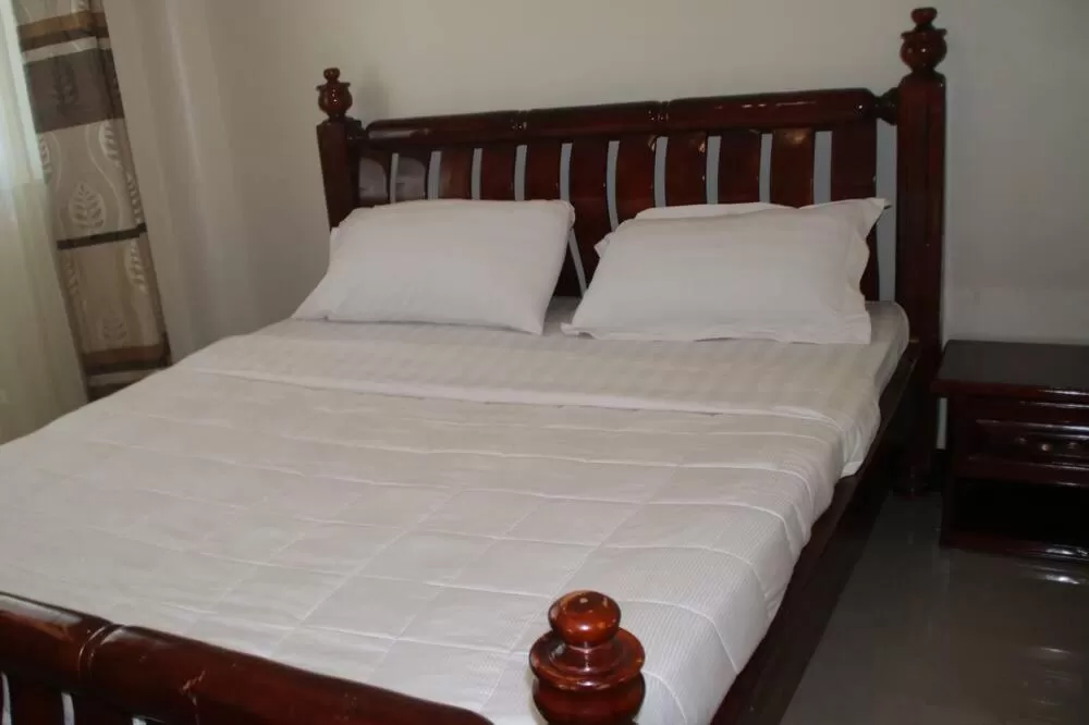 Bed in Acactus Hotel