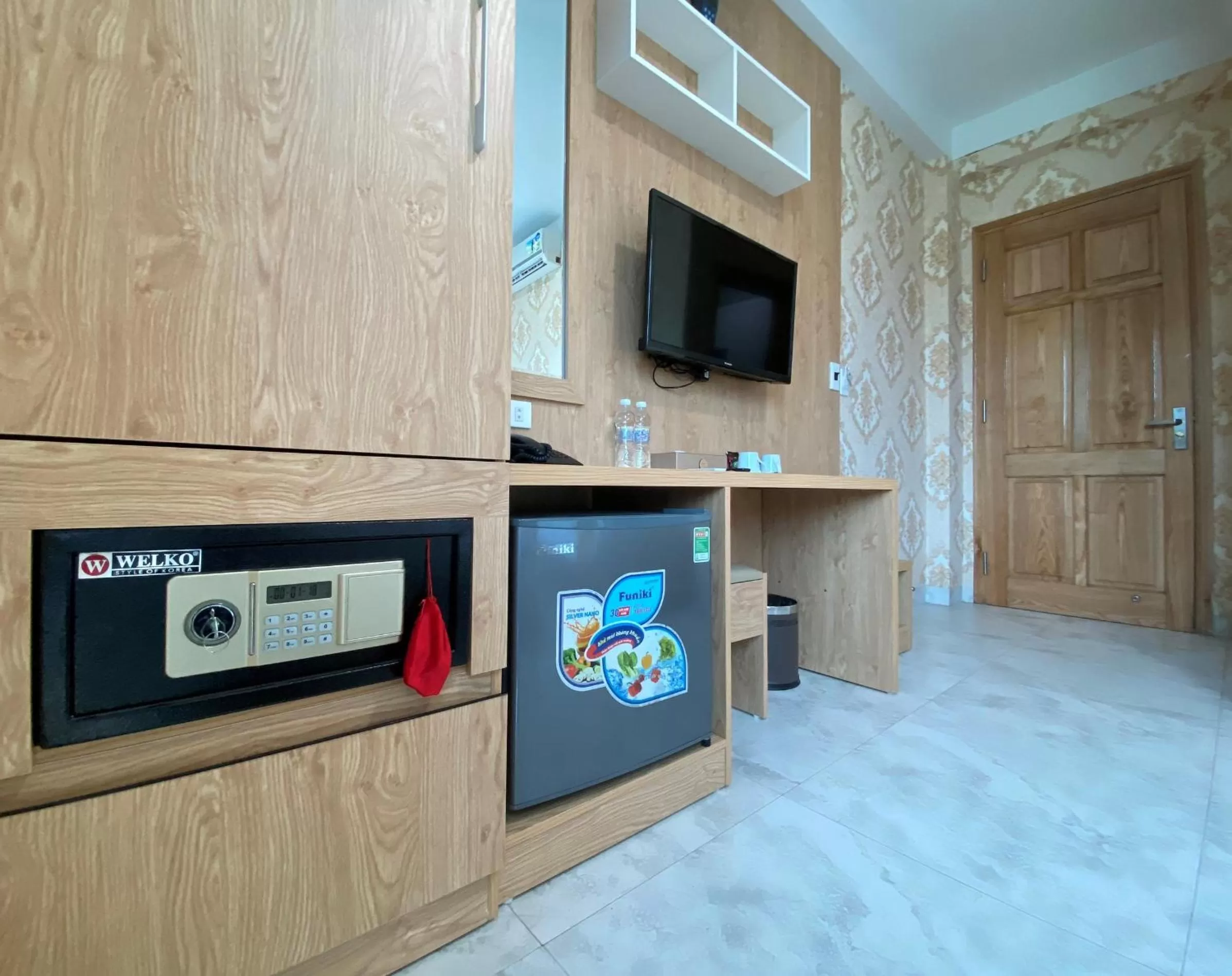 Bedroom in Cozynibi Hotel