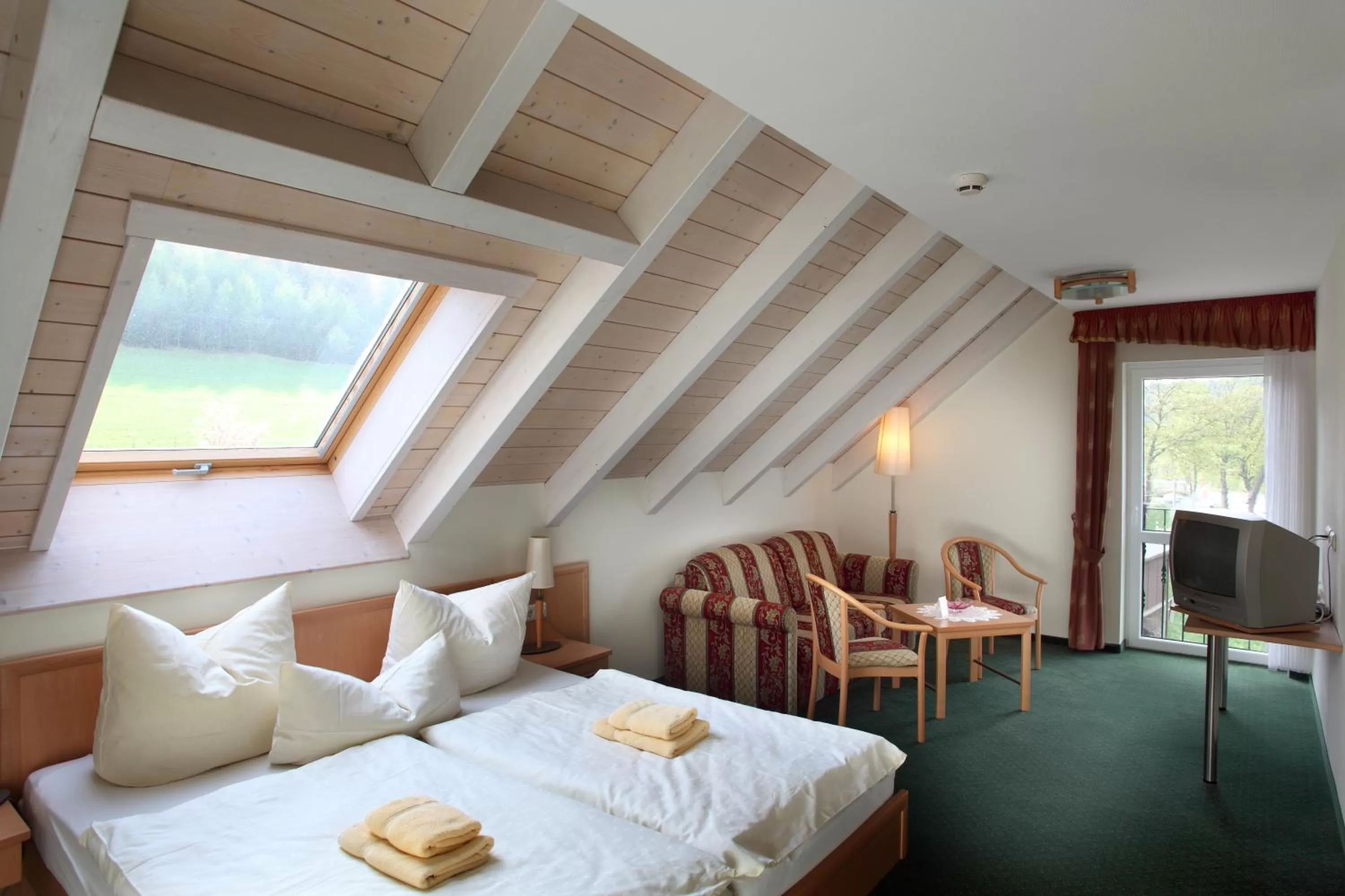 Photo of the whole room, Bed in Landhotel Rittersgrün