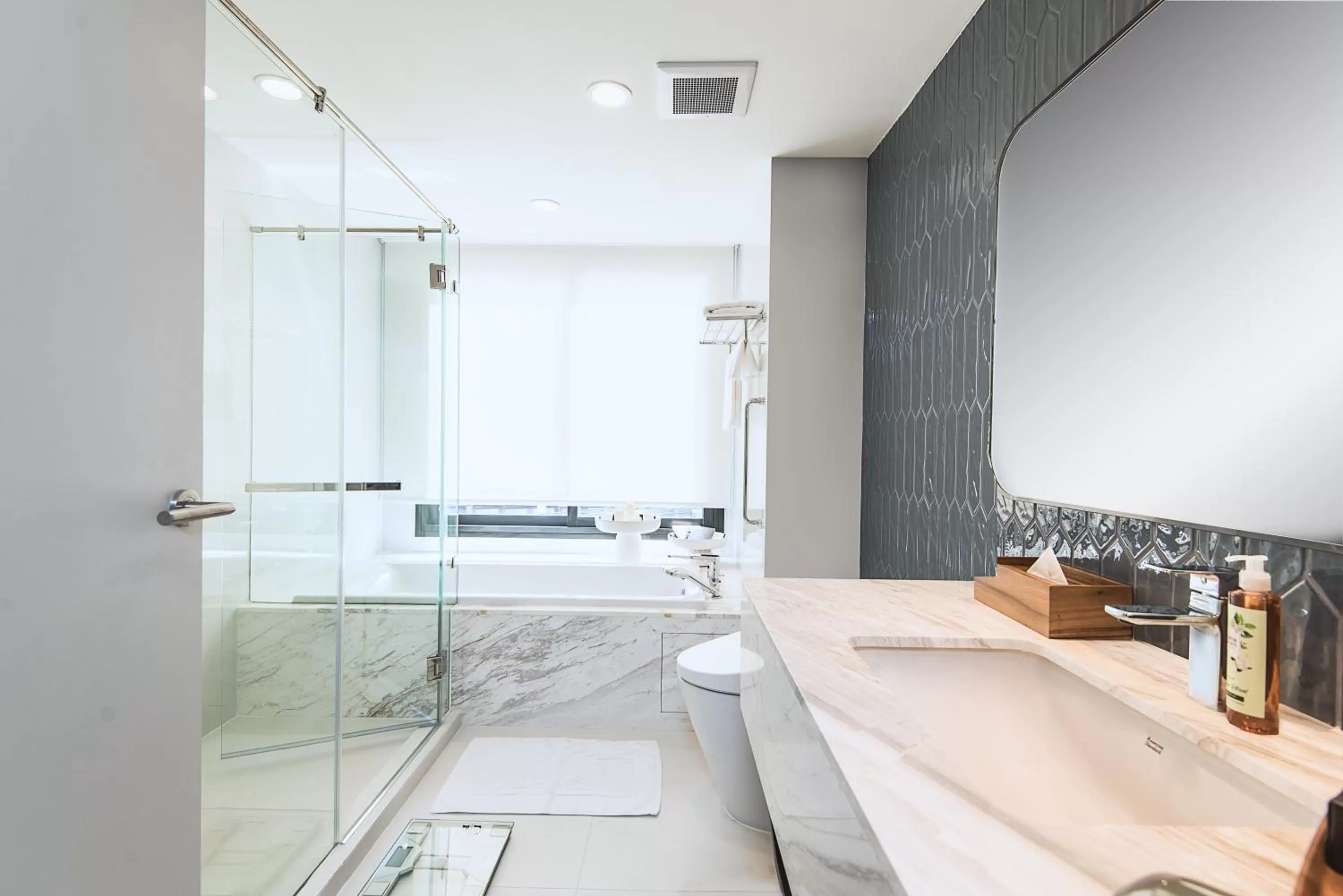 Shower in Amanta Hotel & Residence Sathorn