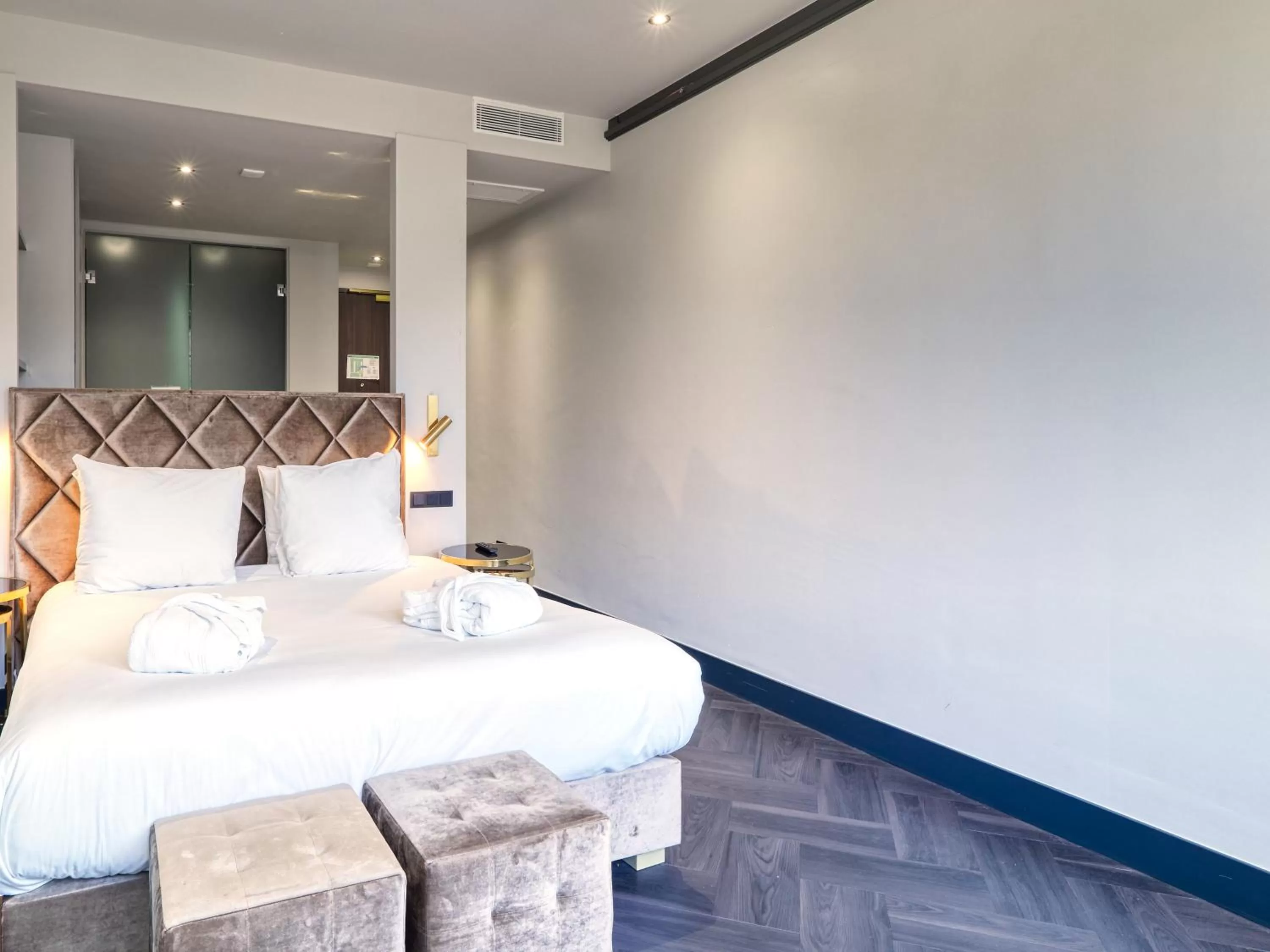 Bed in Triple G Hotels