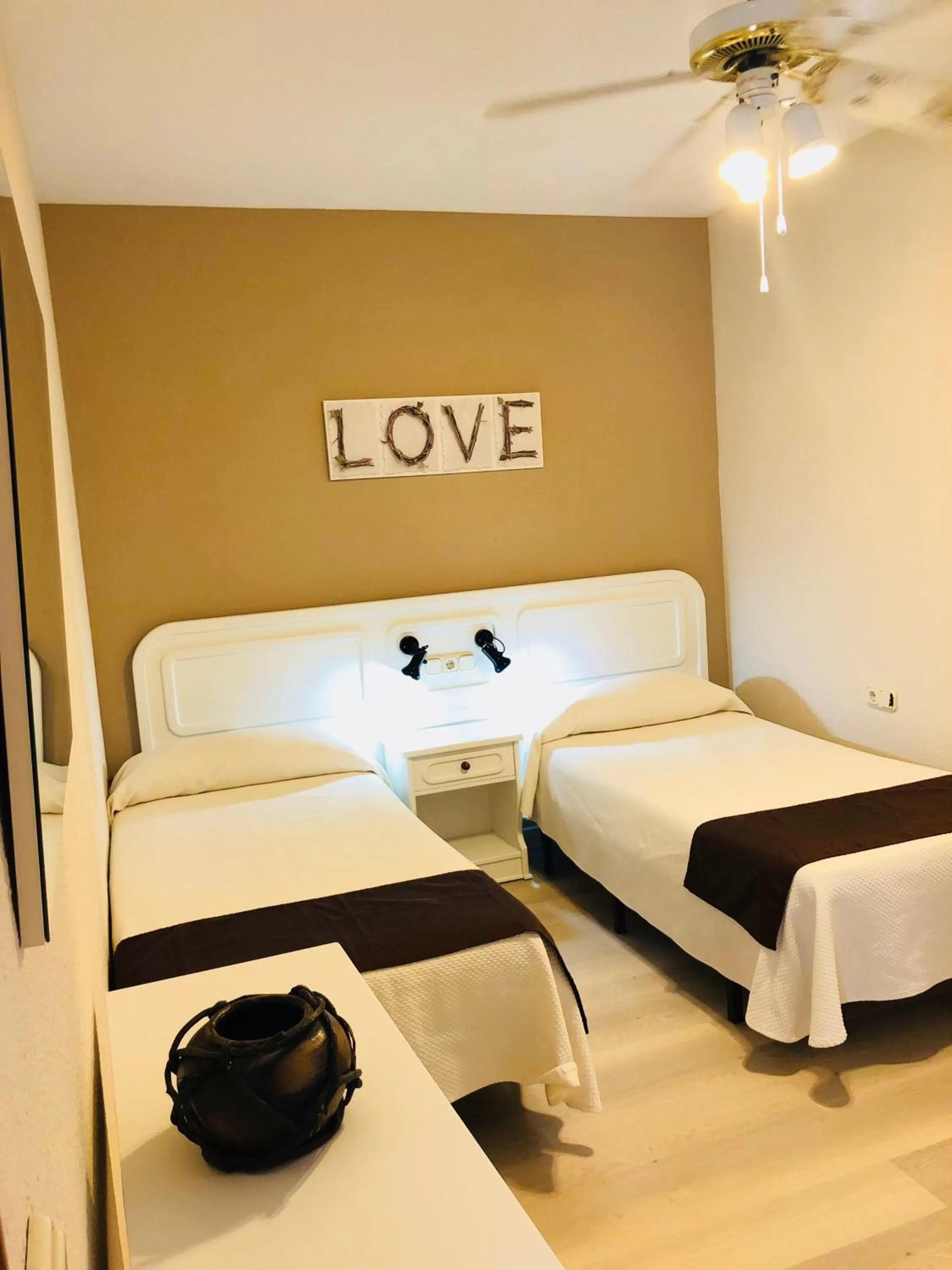 Bed in Regency Torviscas Apartments and Suites