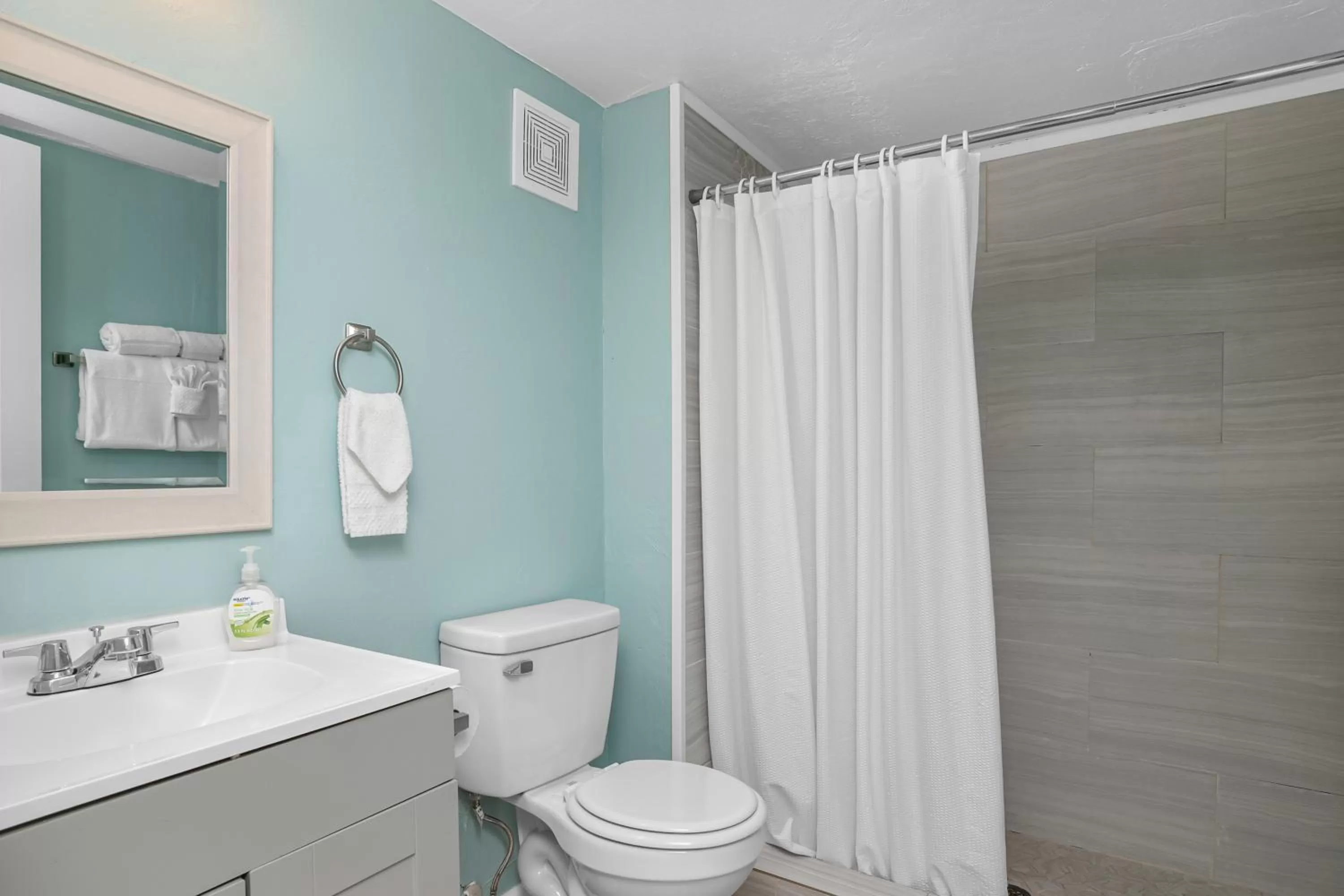 Toilet in Latitude 26 Waterfront Resort and Marina