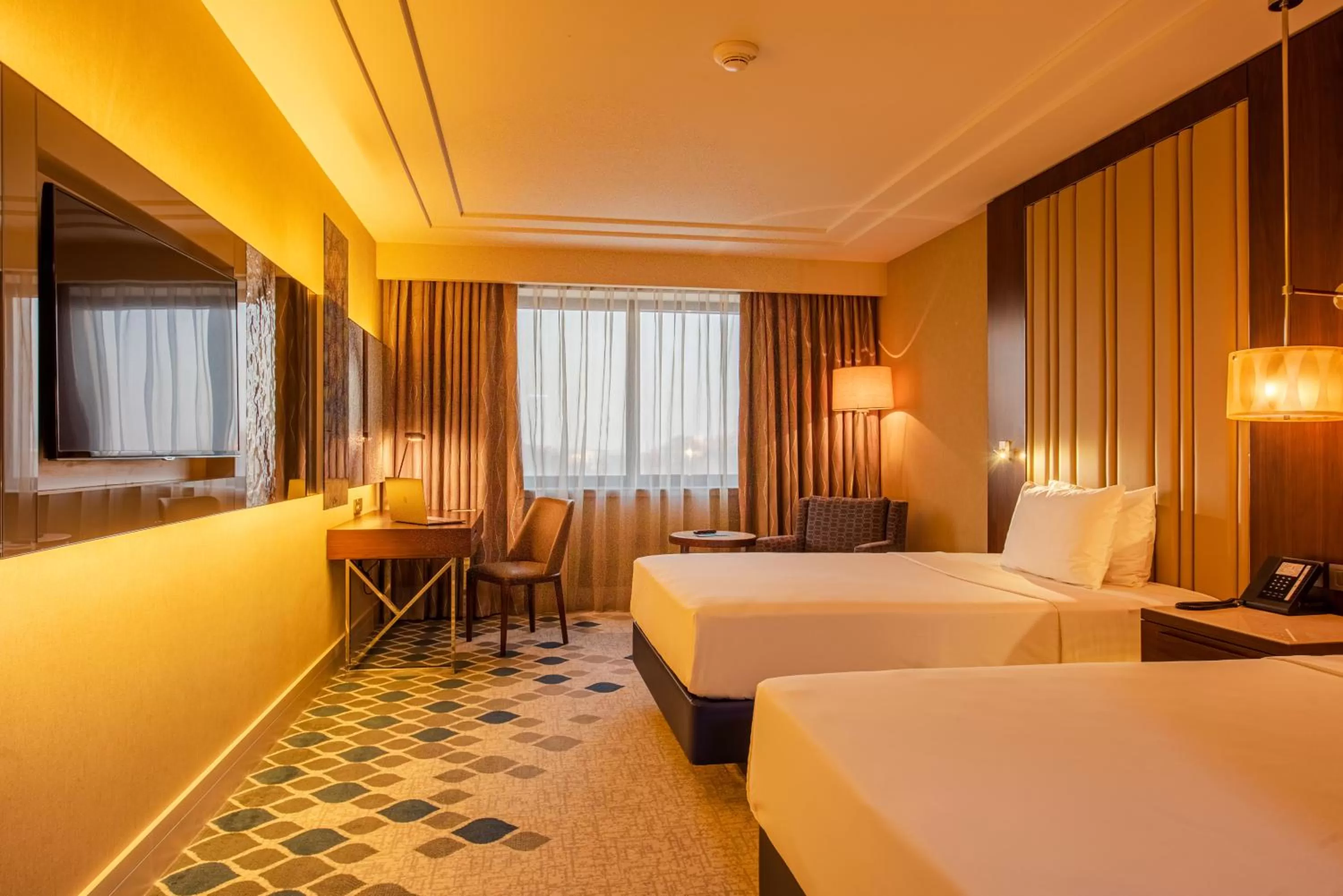 Photo of the whole room, Bed in AZIMUT Grand Hotel Tashkent