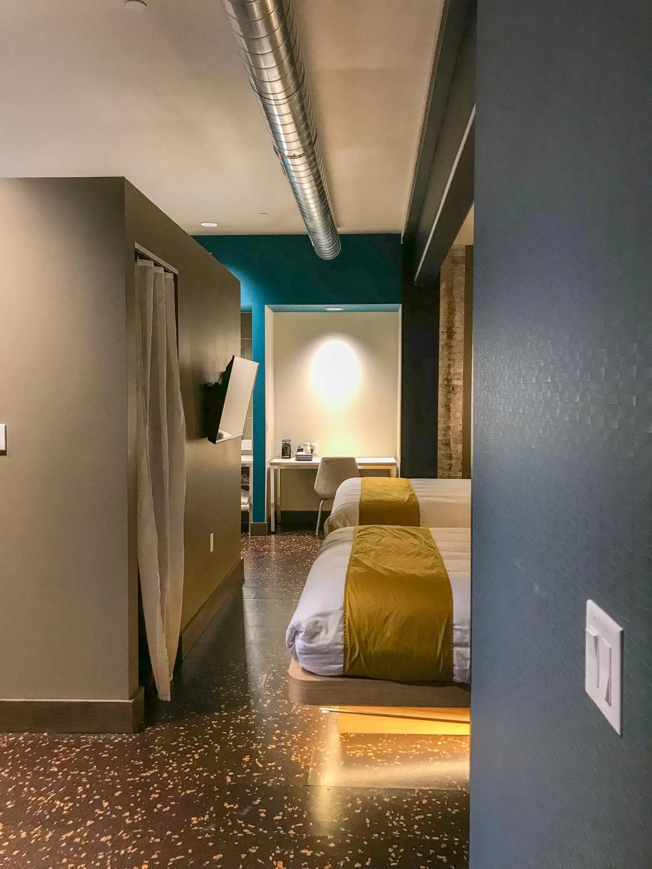 Bed in CityFlatsHotel - Grand Rapids, an Ascend Collection Hotel